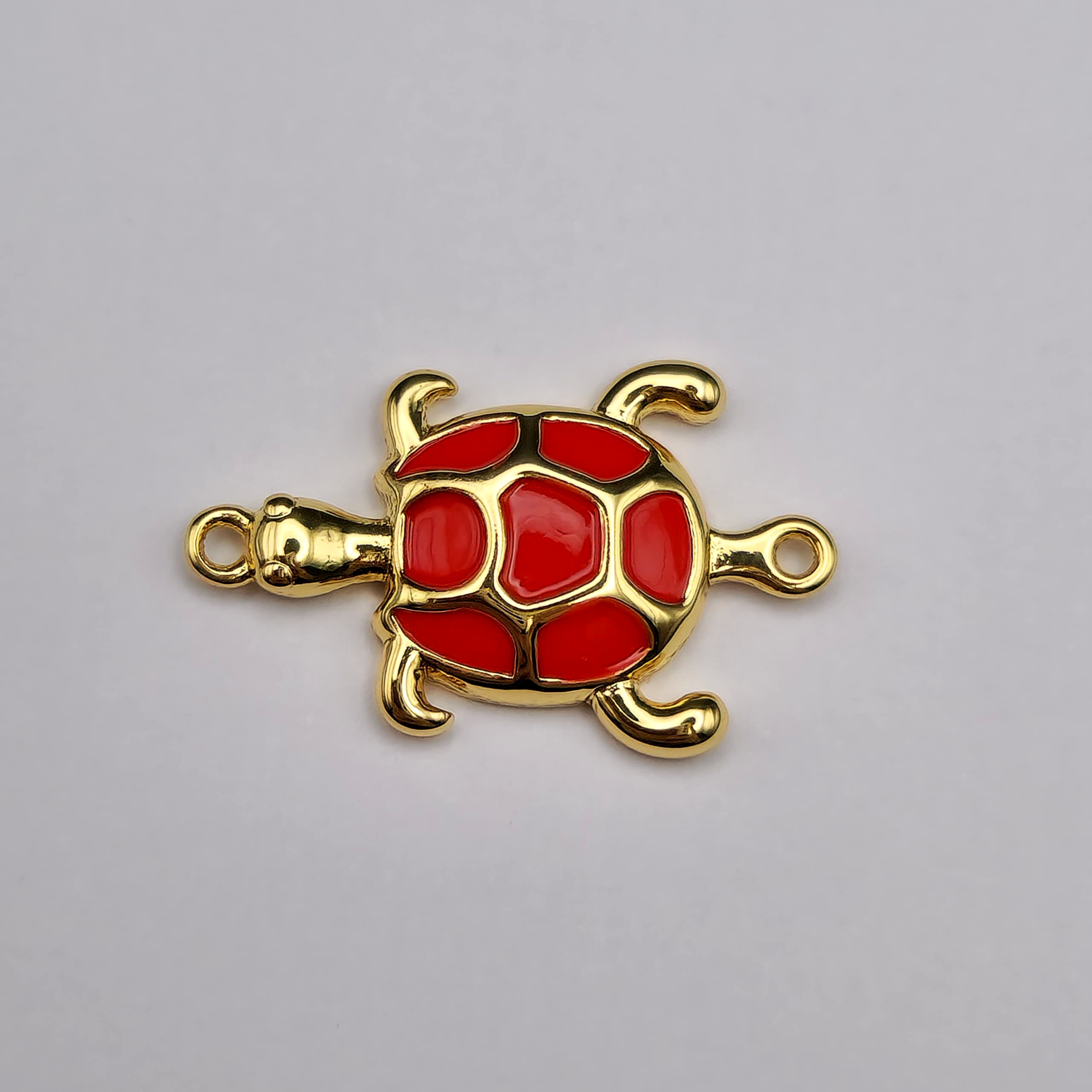 ORO CHINO CONECTOR TORTUGA ROJA