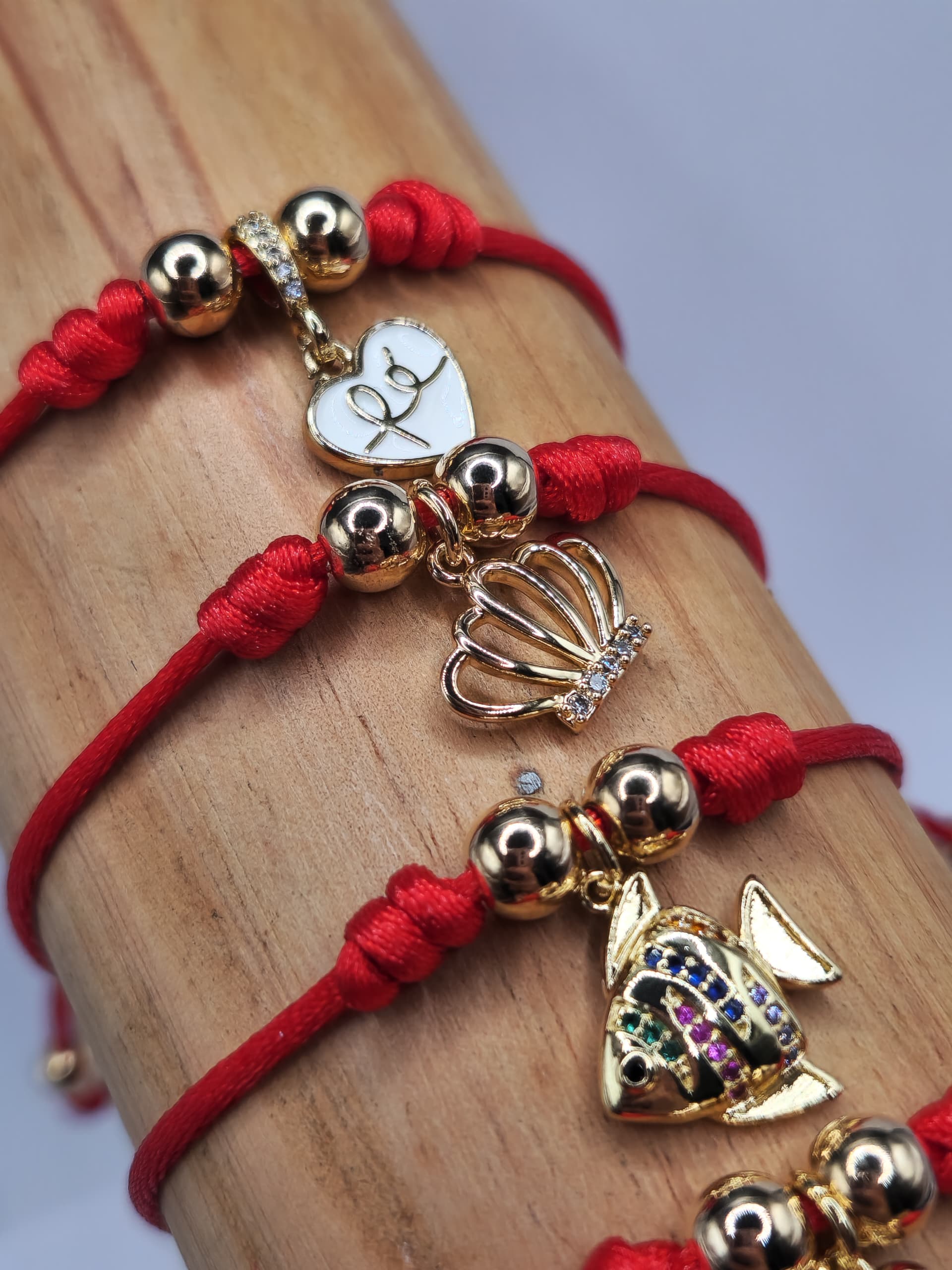 PULSERA ROJA COLA DE RATON CON DIJE