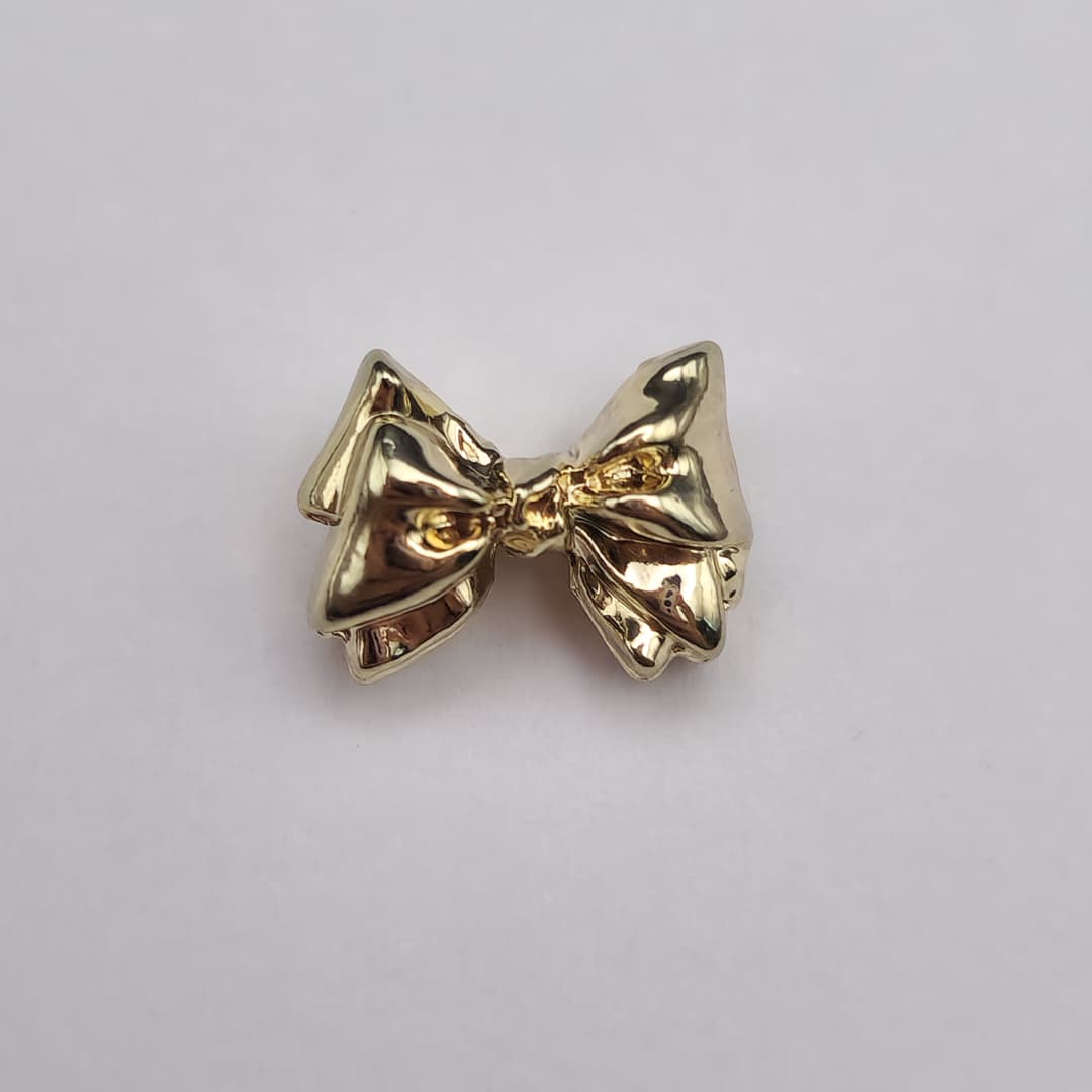 ORO CHINO PASADOR LAZO DORADO