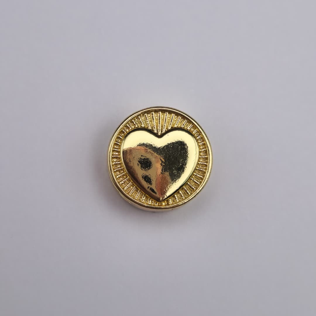 ORO CHINO PASADOR CRUZ CON CORAZON
