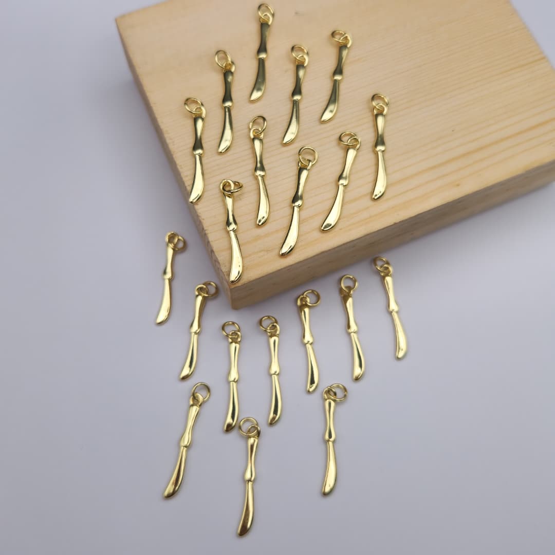 DIJE DE ORO CHINO CUCHILLO DE MANTEQUILLA 4