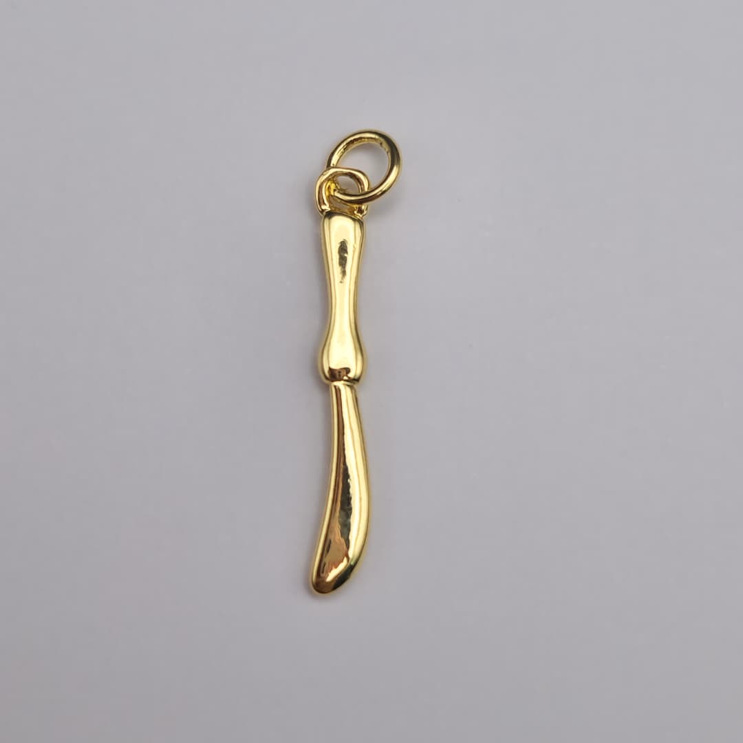 DIJE DE ORO CHINO CUCHILLO DE MANTEQUILLA