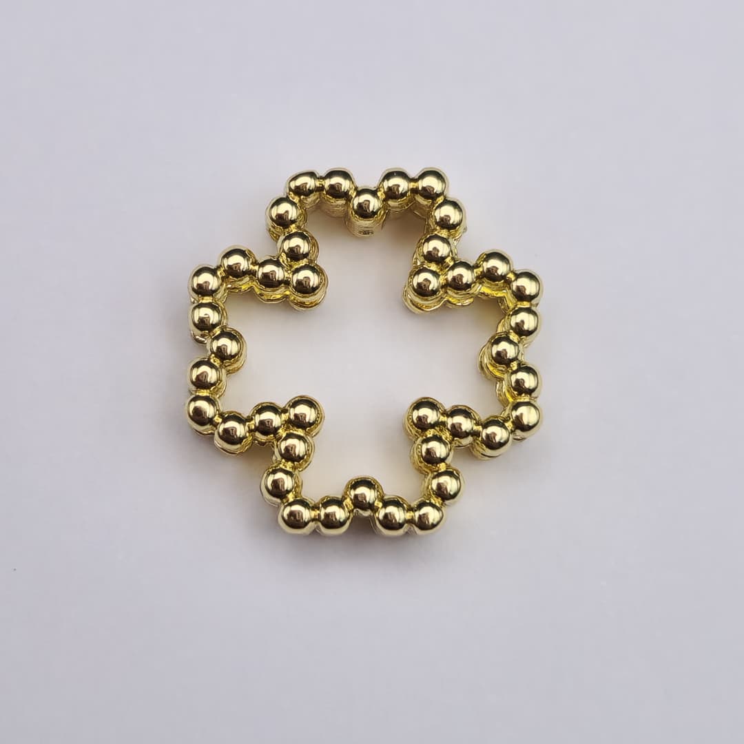 ORO CHINO PASADOR DE TREBOL