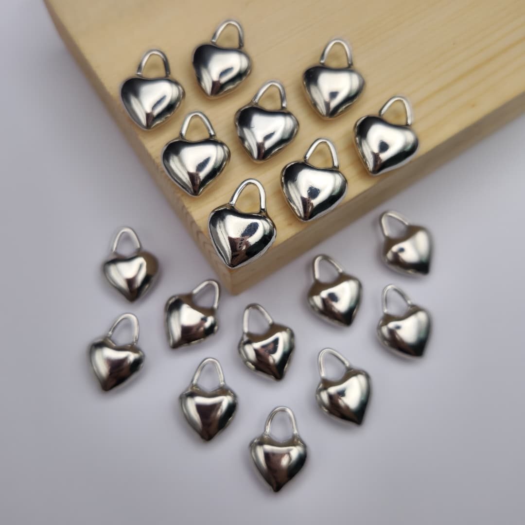DIJE DE ORO CHINO CORAZON PLATEADO 4