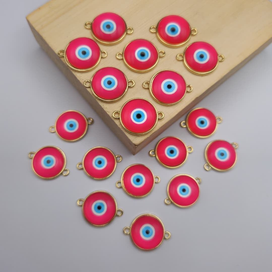 ORO CHINO CONECTOR OJO TURCO FUCSIA 4