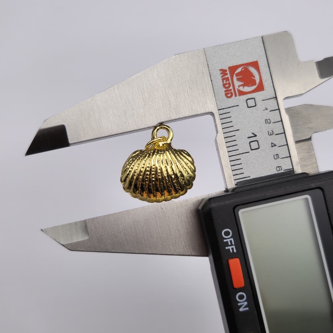 DIJE DE ORO CHINO ALMEJA 3