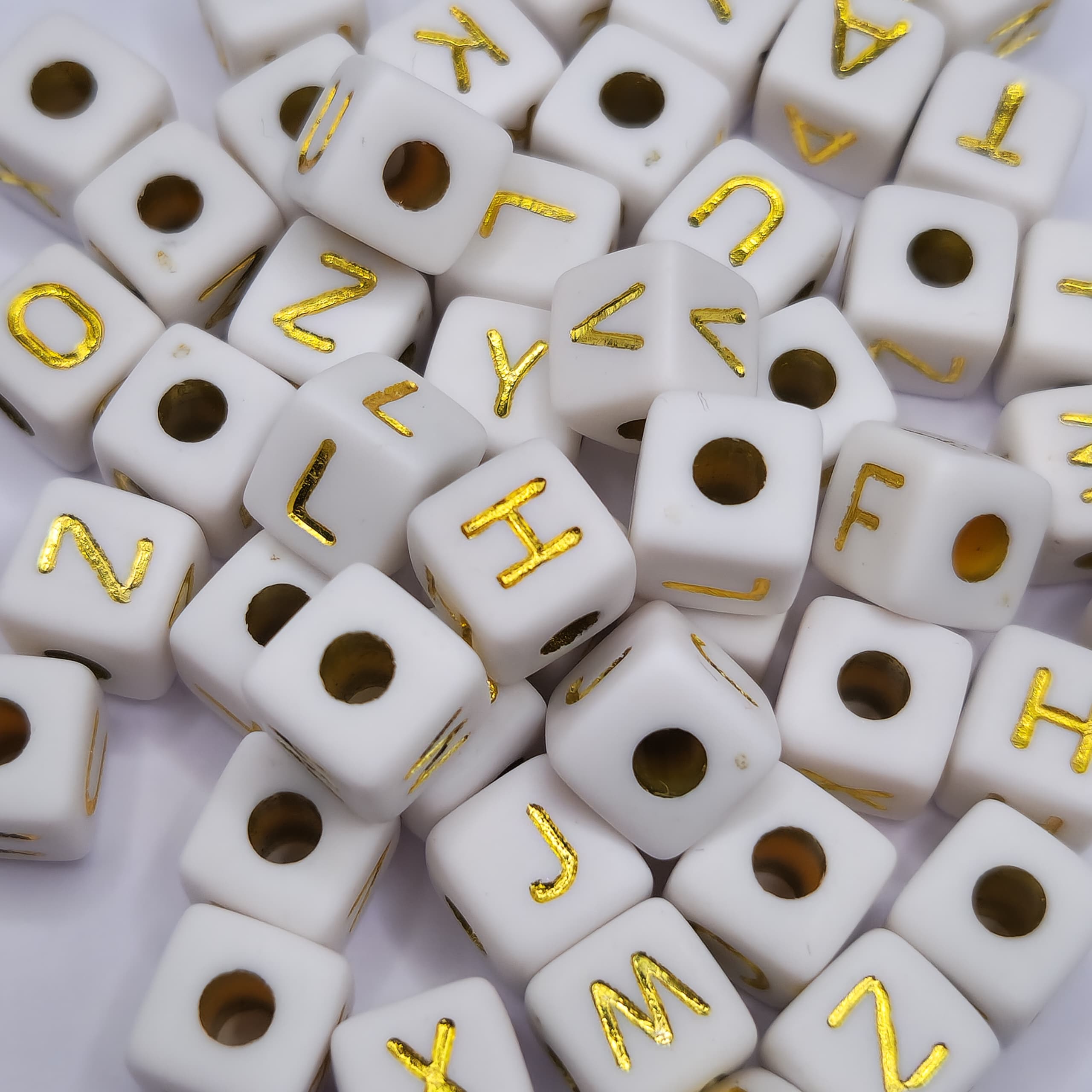BOLSA 12 UND LETRAS CUBOS BLANCA CON DORADO