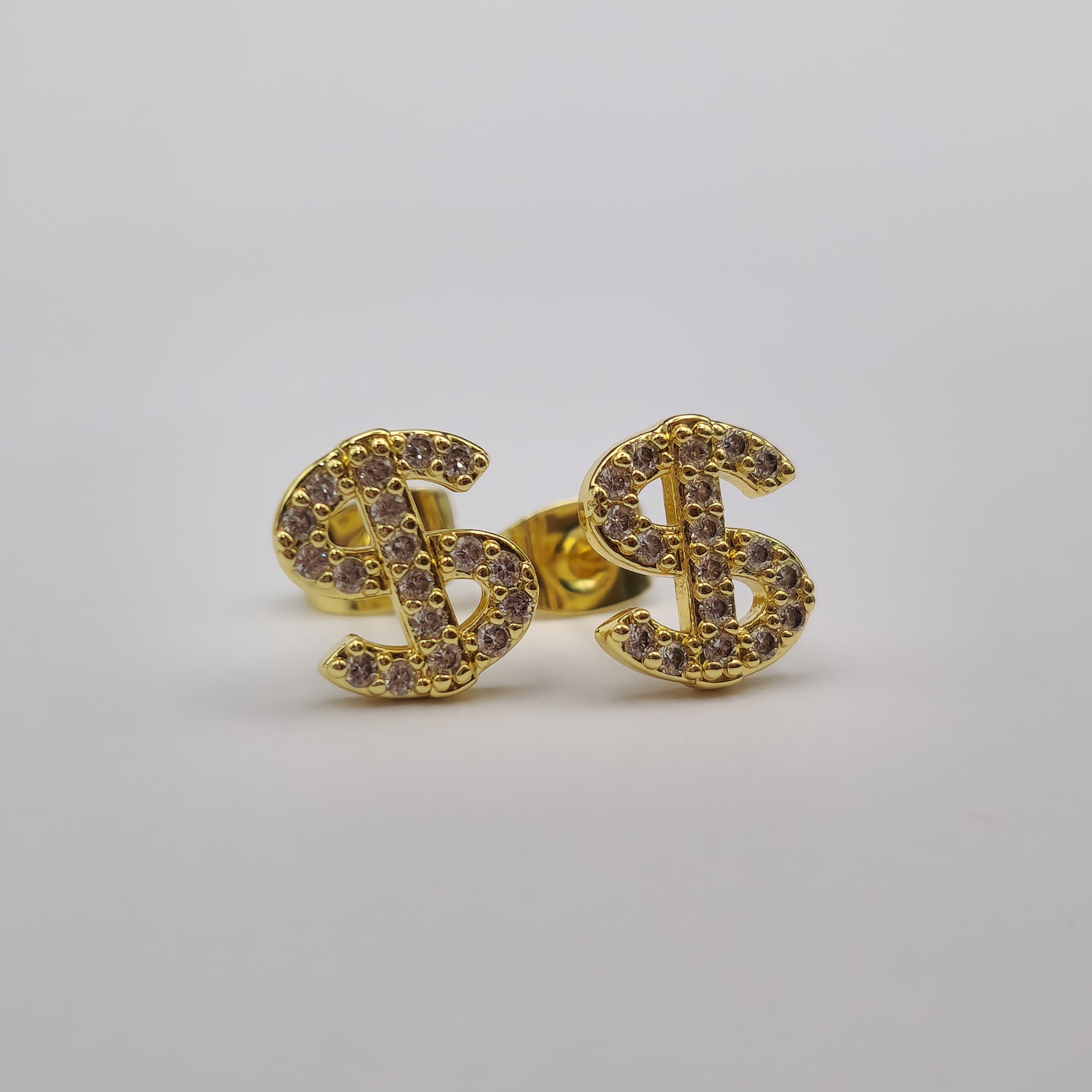 ZARCILLOS SIGNO DE DOLAR CON CIRCON