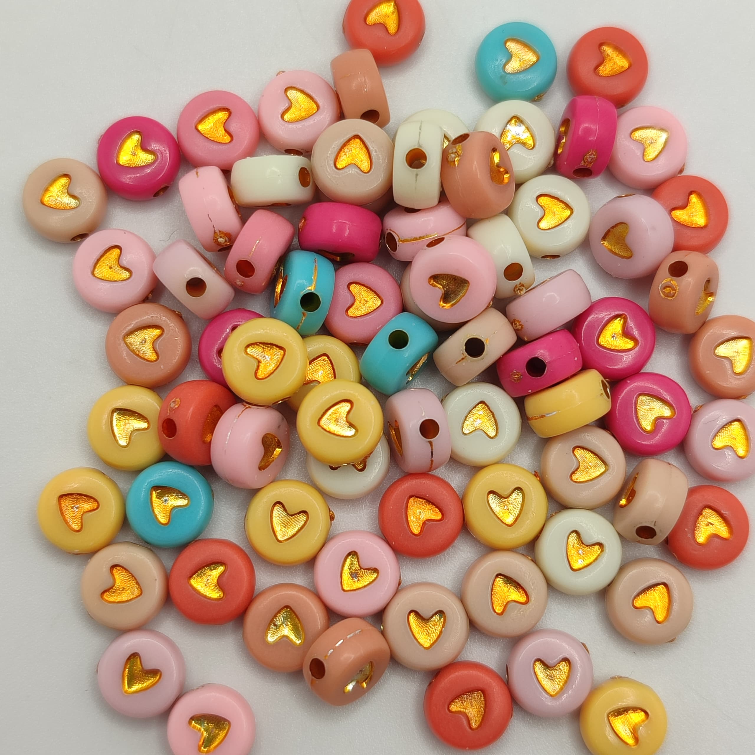 BOLSA 10G CORAZON COLORES CON RELLENO DORADO