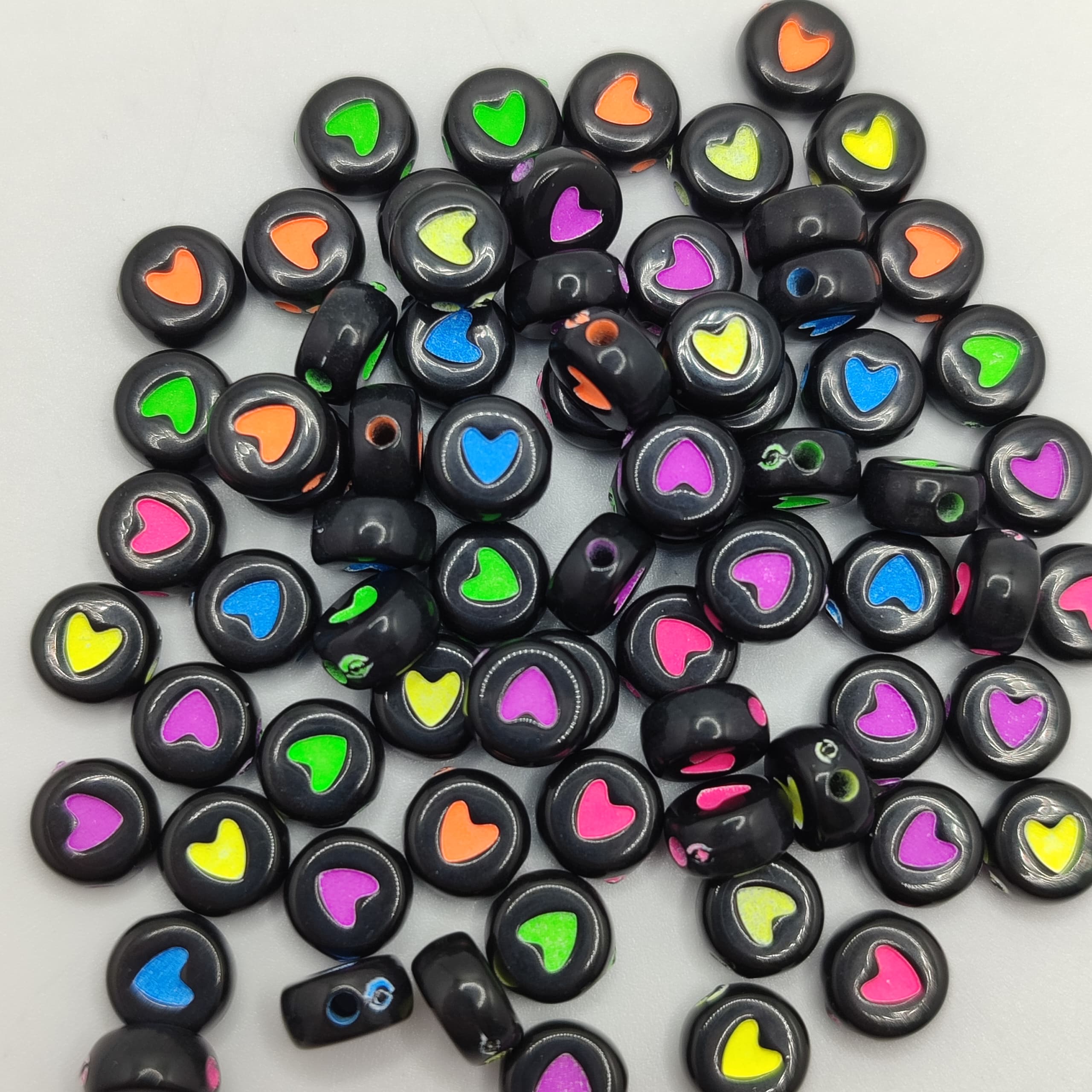 BOLSA 10G CORAZON NEGRO  RELLENO  COLORES