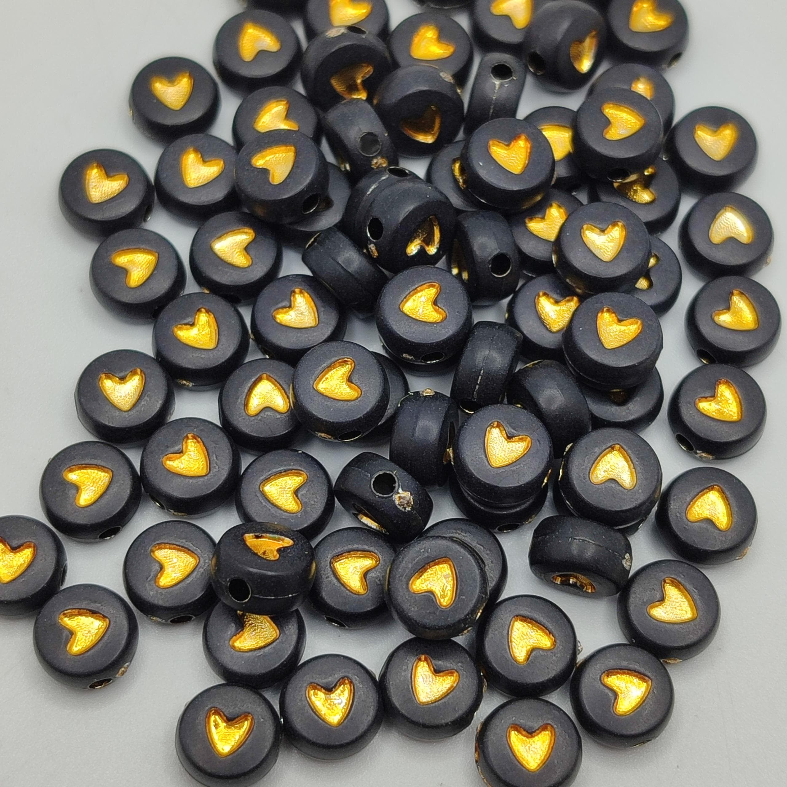 BOLSA 10G CORAZON NEGRO  CON RELLENO DORADO