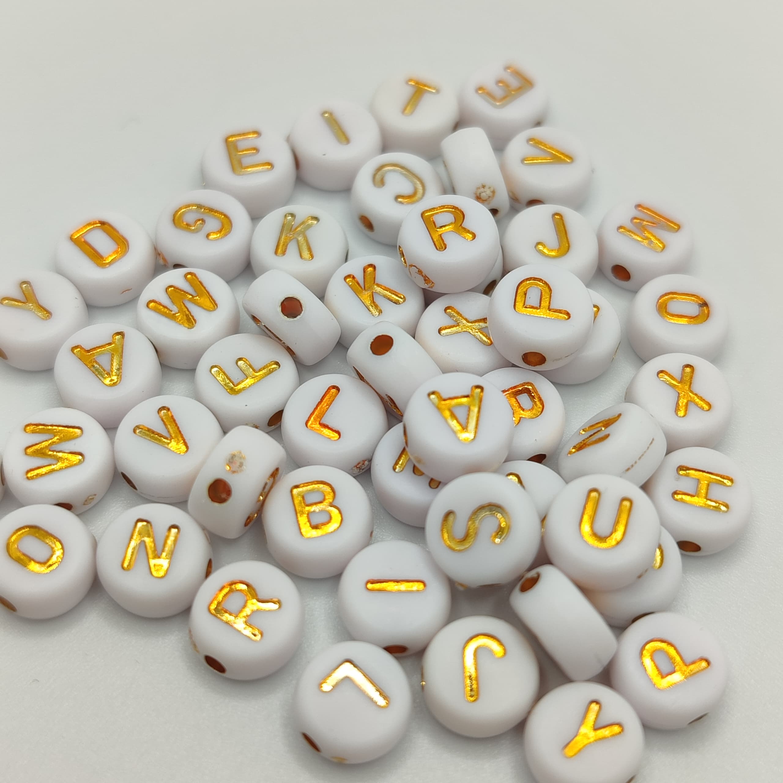 BOLSA 2 ABECEDARIOS LETRAS DORADAS