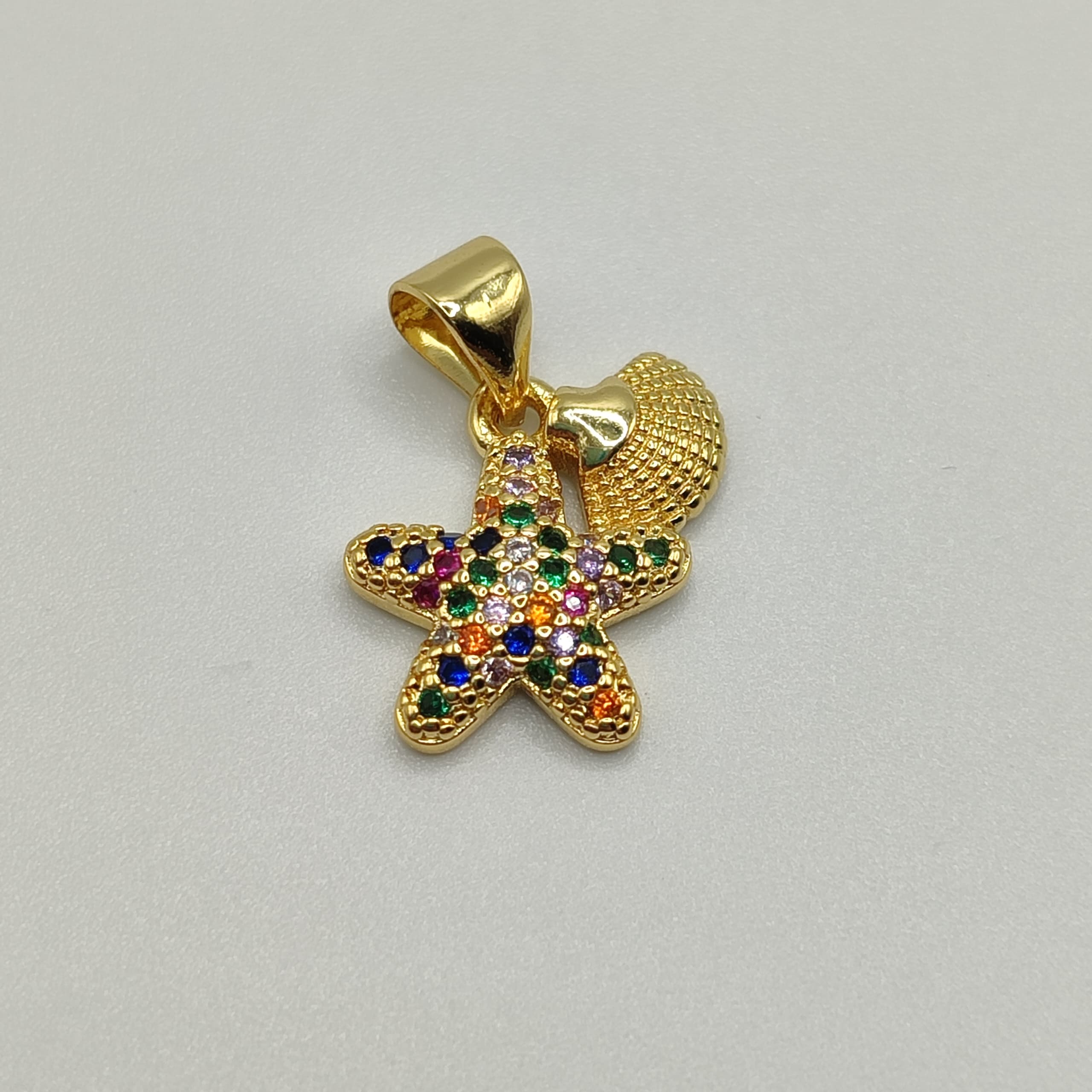 DIJE CIRCON COLORES ESTRELLA Y CONCHA DE