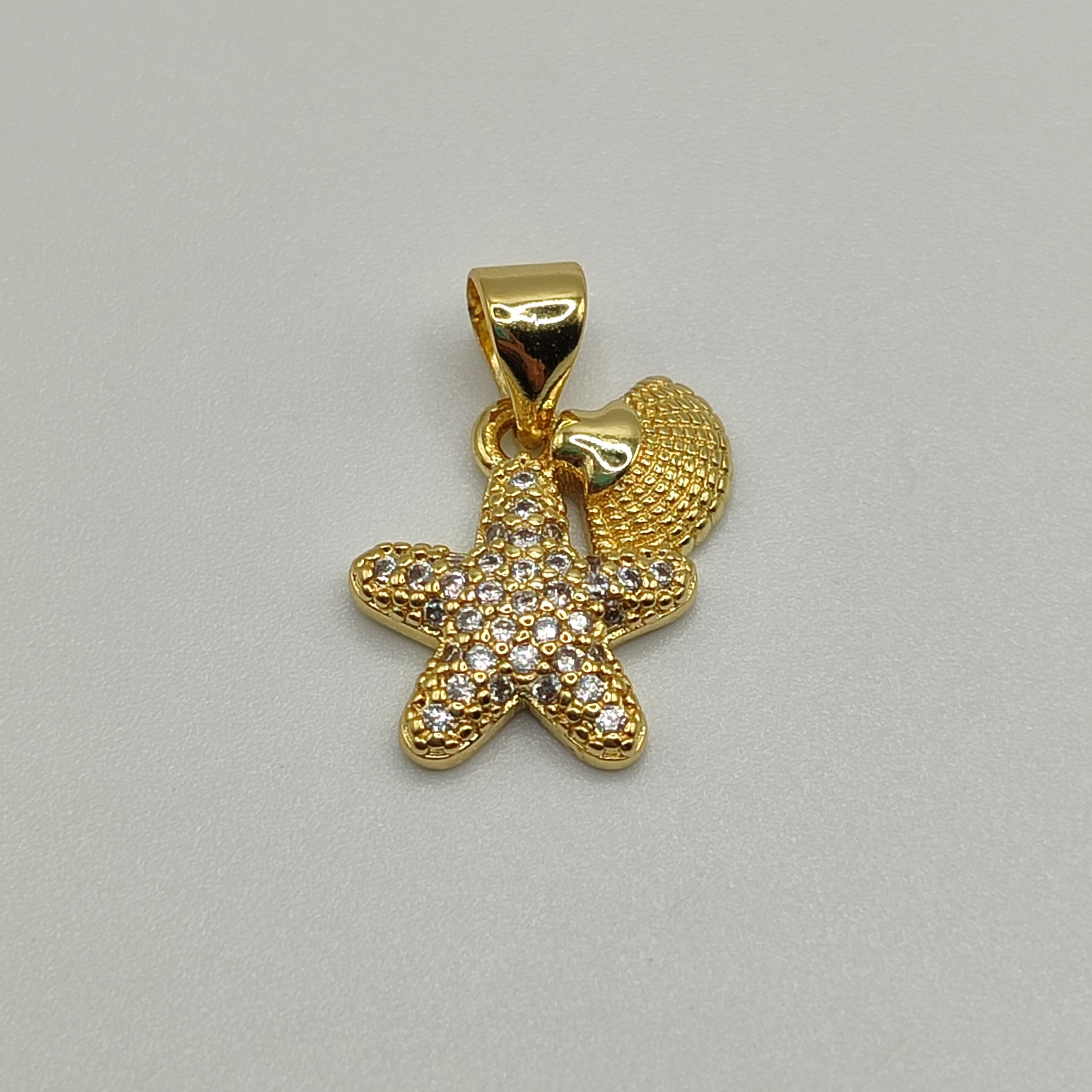 DIJE CIRCON ESTRELLA Y CONCHA DE MAR MINI