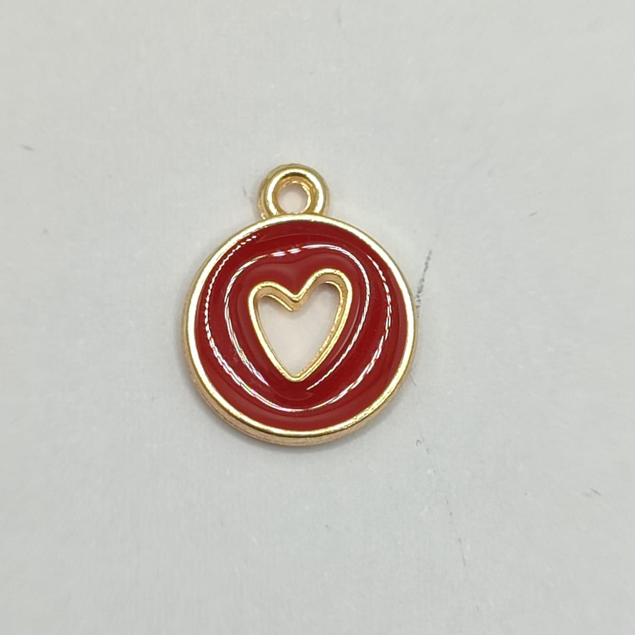 DIJE ESMALTADO CORAZON HUECO  ROJO