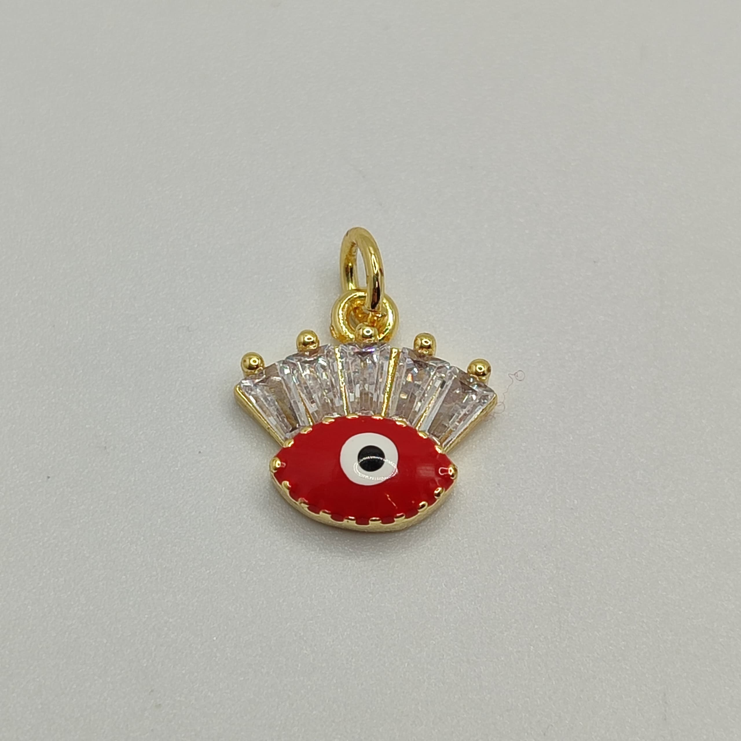 DIJE ESMALTADO DE OJO  TURCO ROJO CO N CIR
