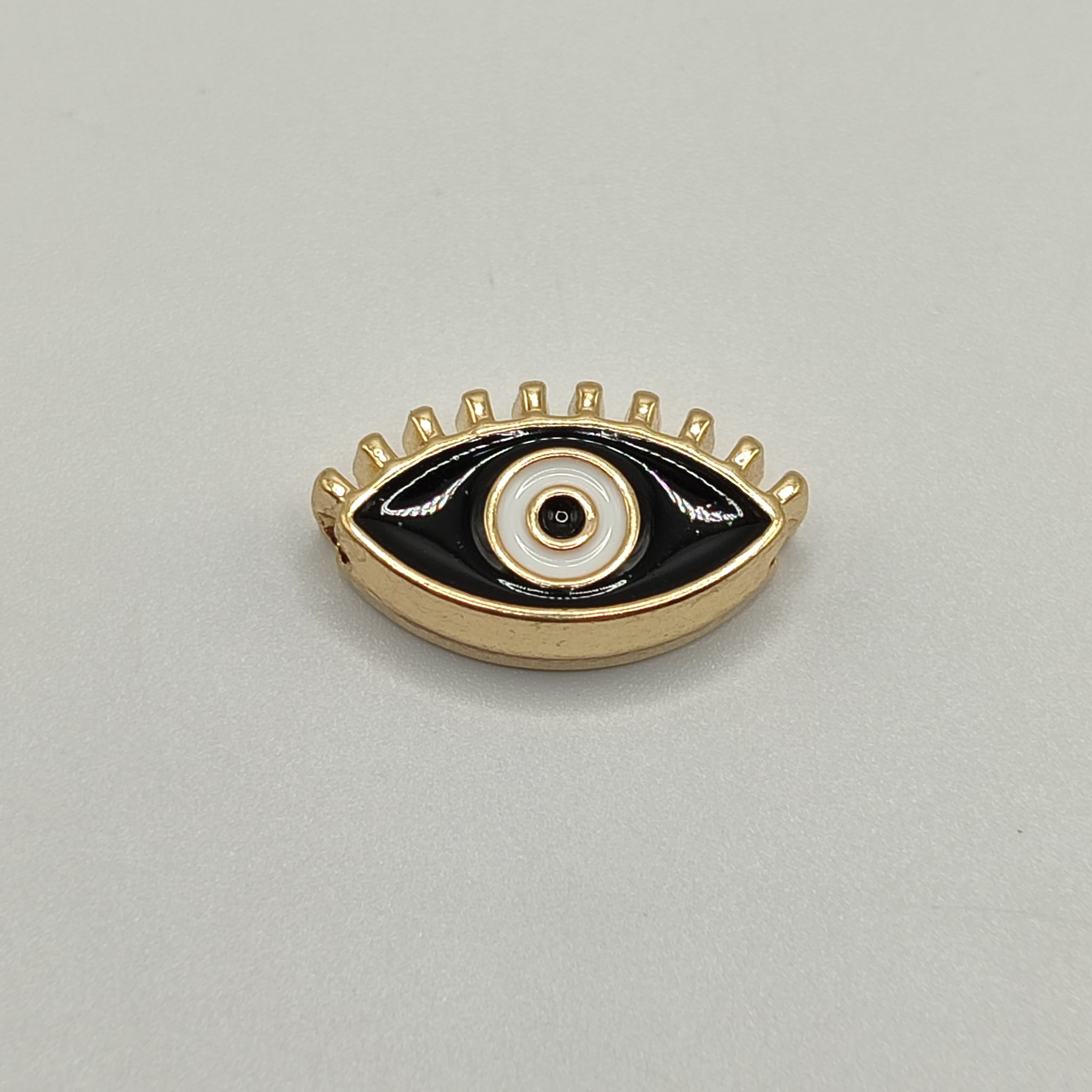 PASADOR ESMALTADO OJO NEGRO