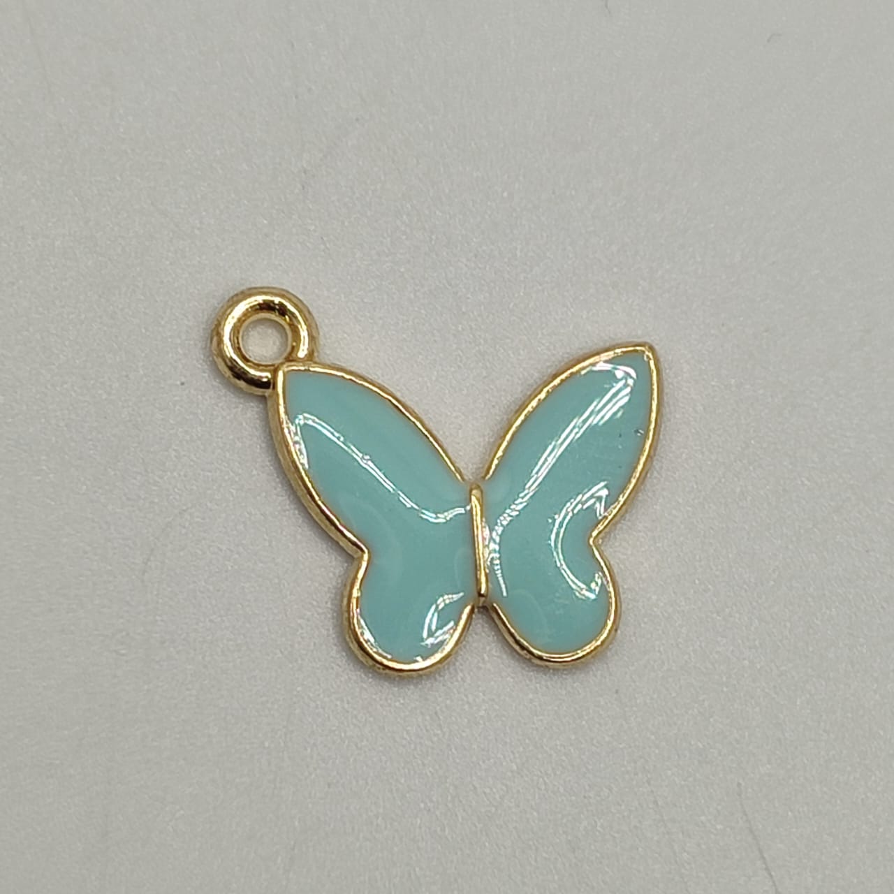 DIJE ESMALTADO MARIPOSA AZUL CLARO M