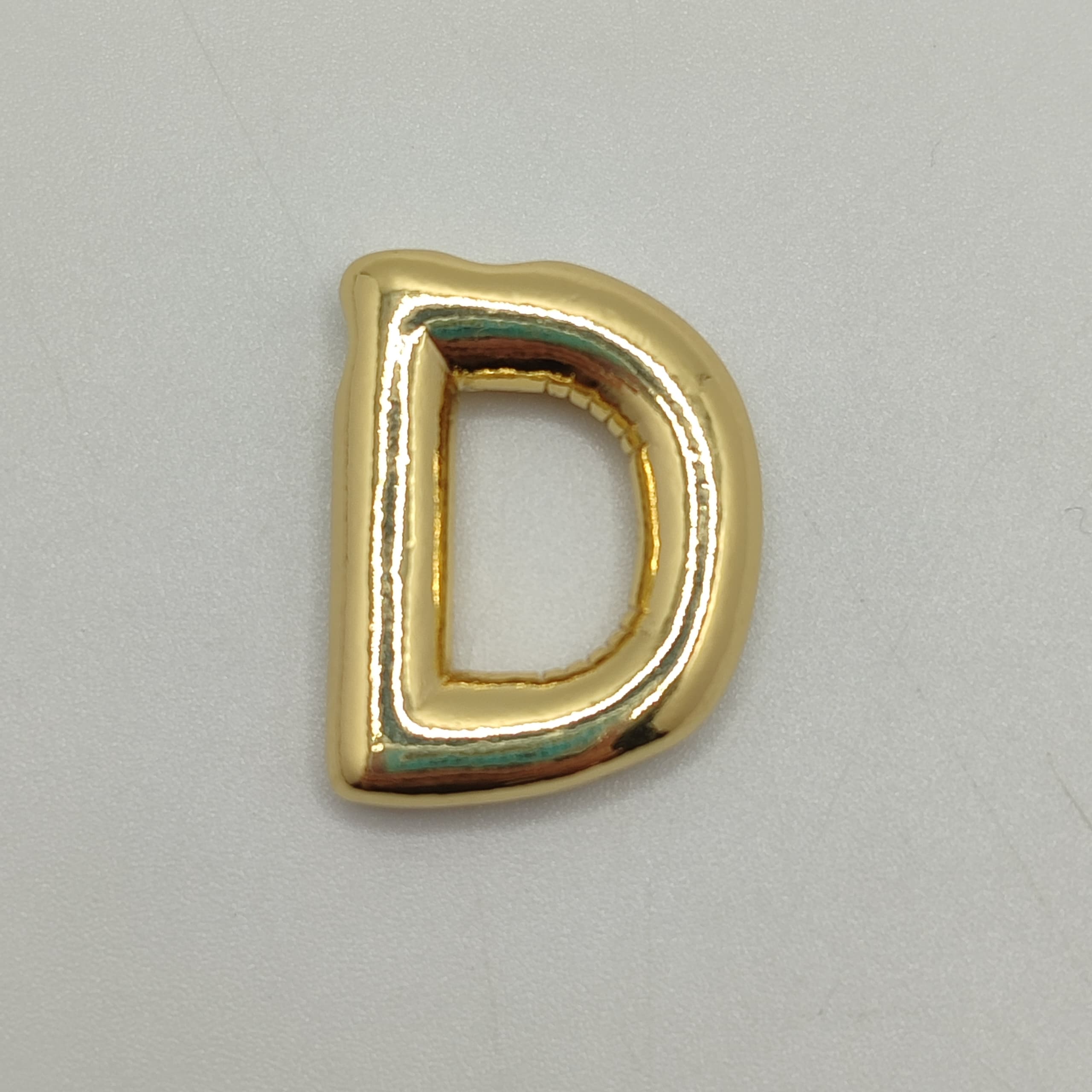 ORO CHINO LETRA D