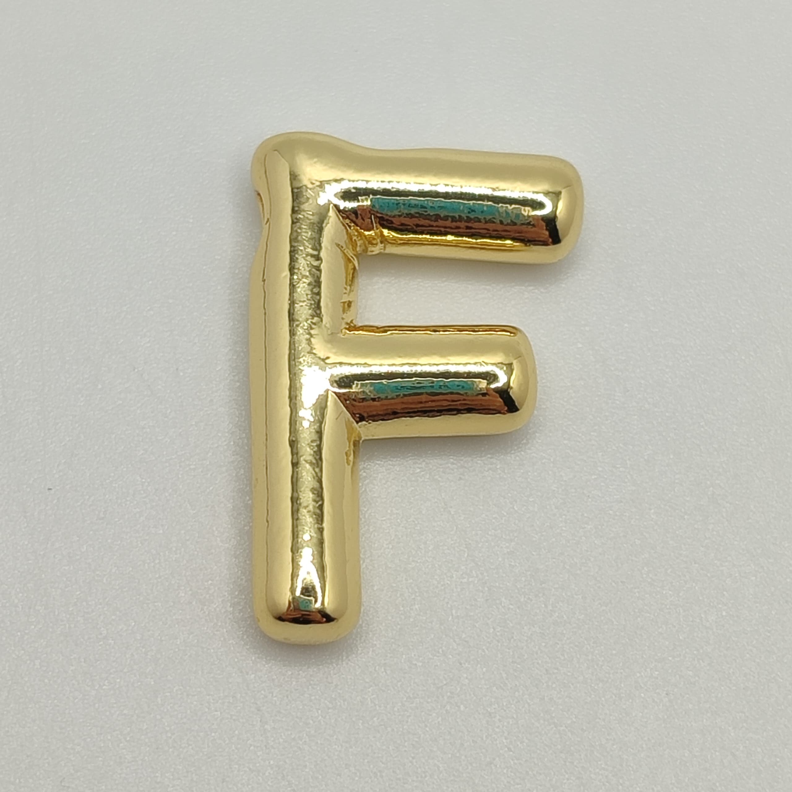 ORO CHINO LETRA F