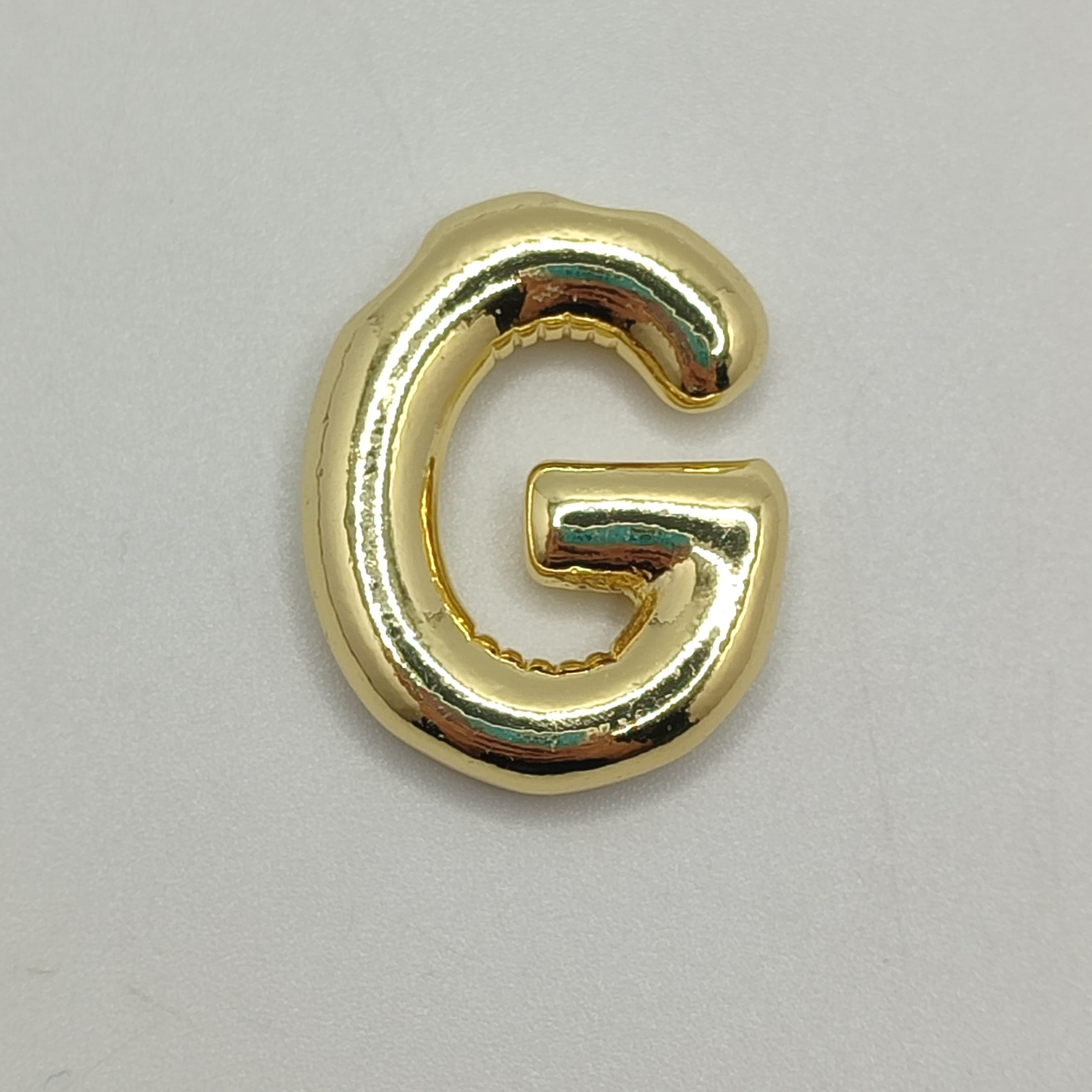 ORO CHINO LETRA G