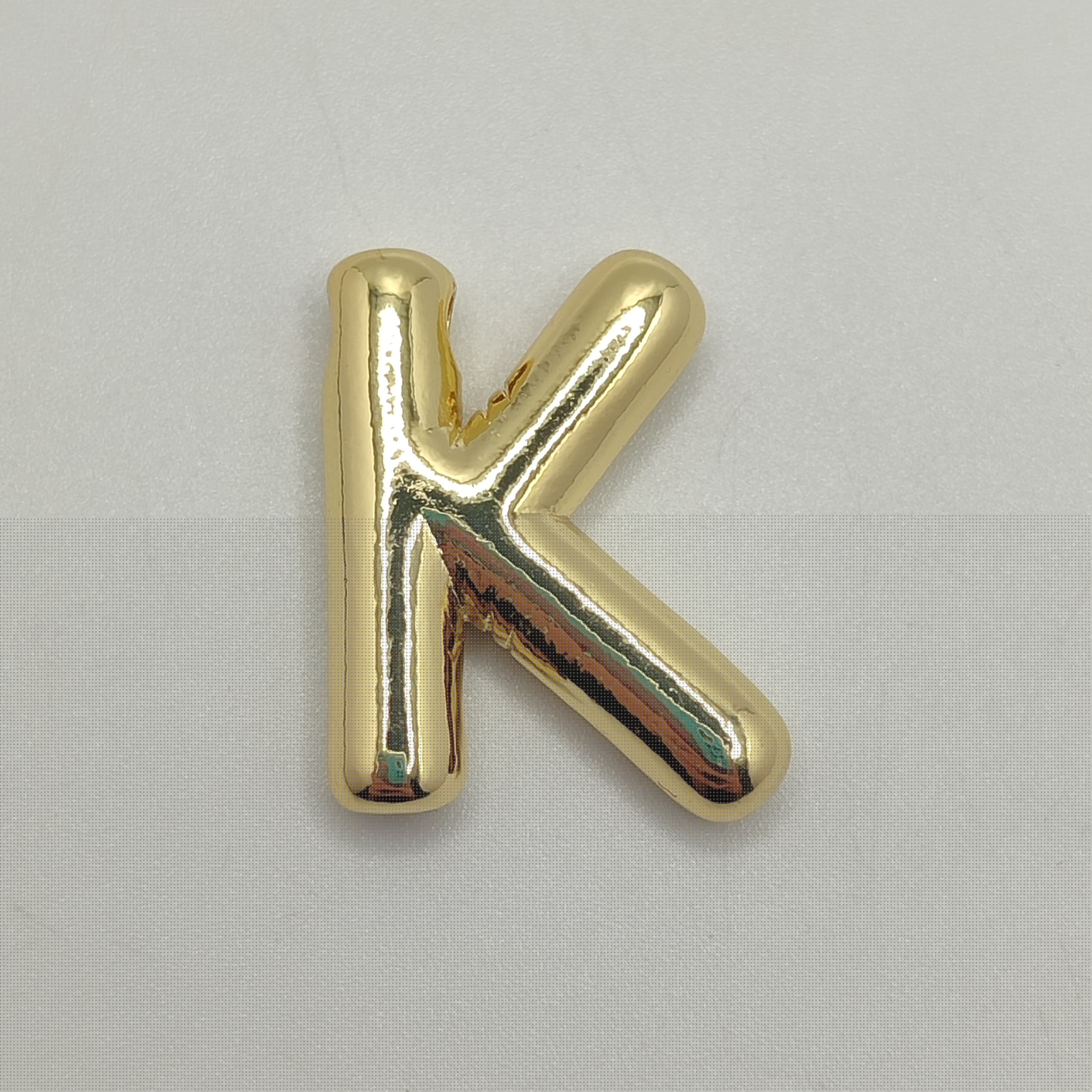 ORO CHINO LETRA K