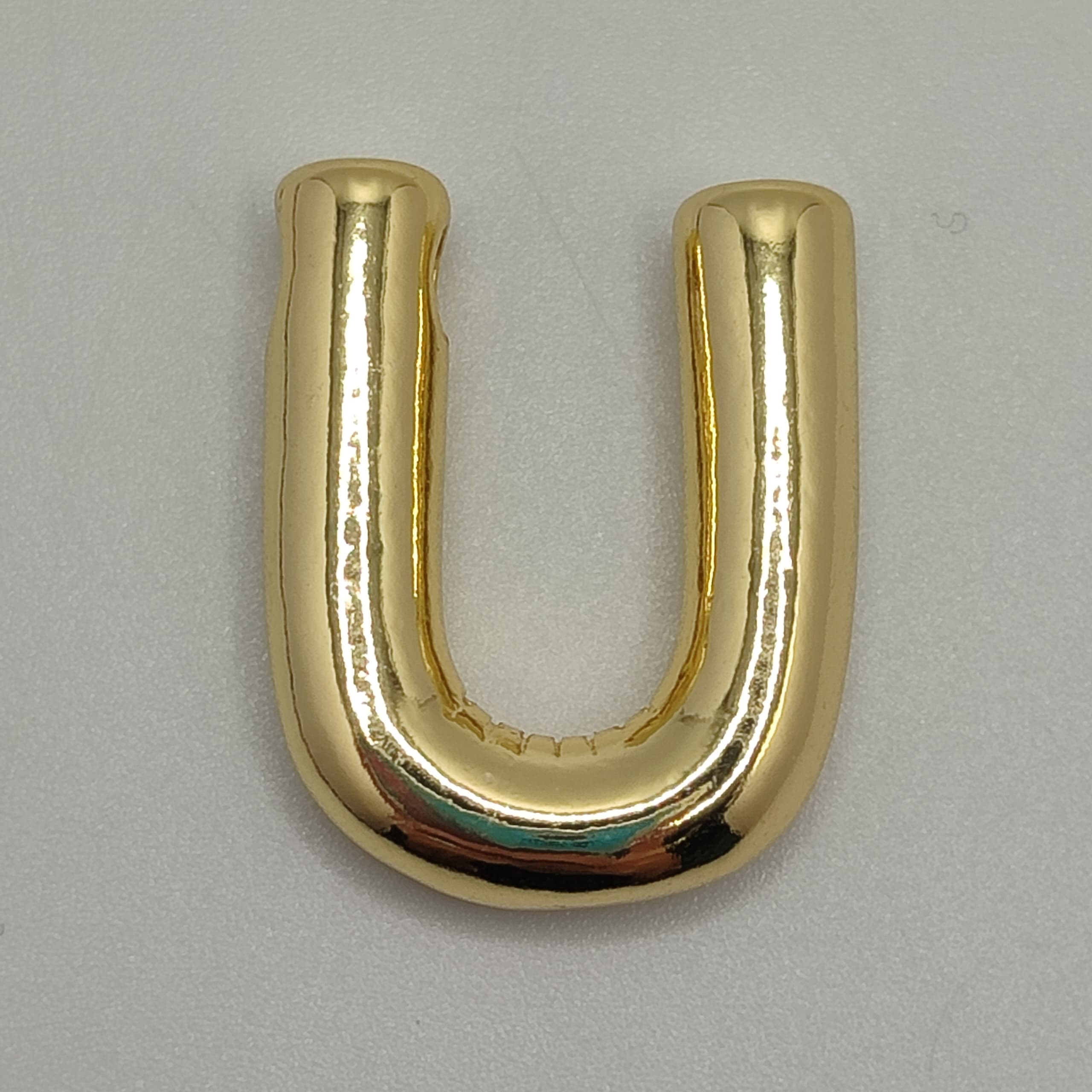 ORO CHINO LETRA U