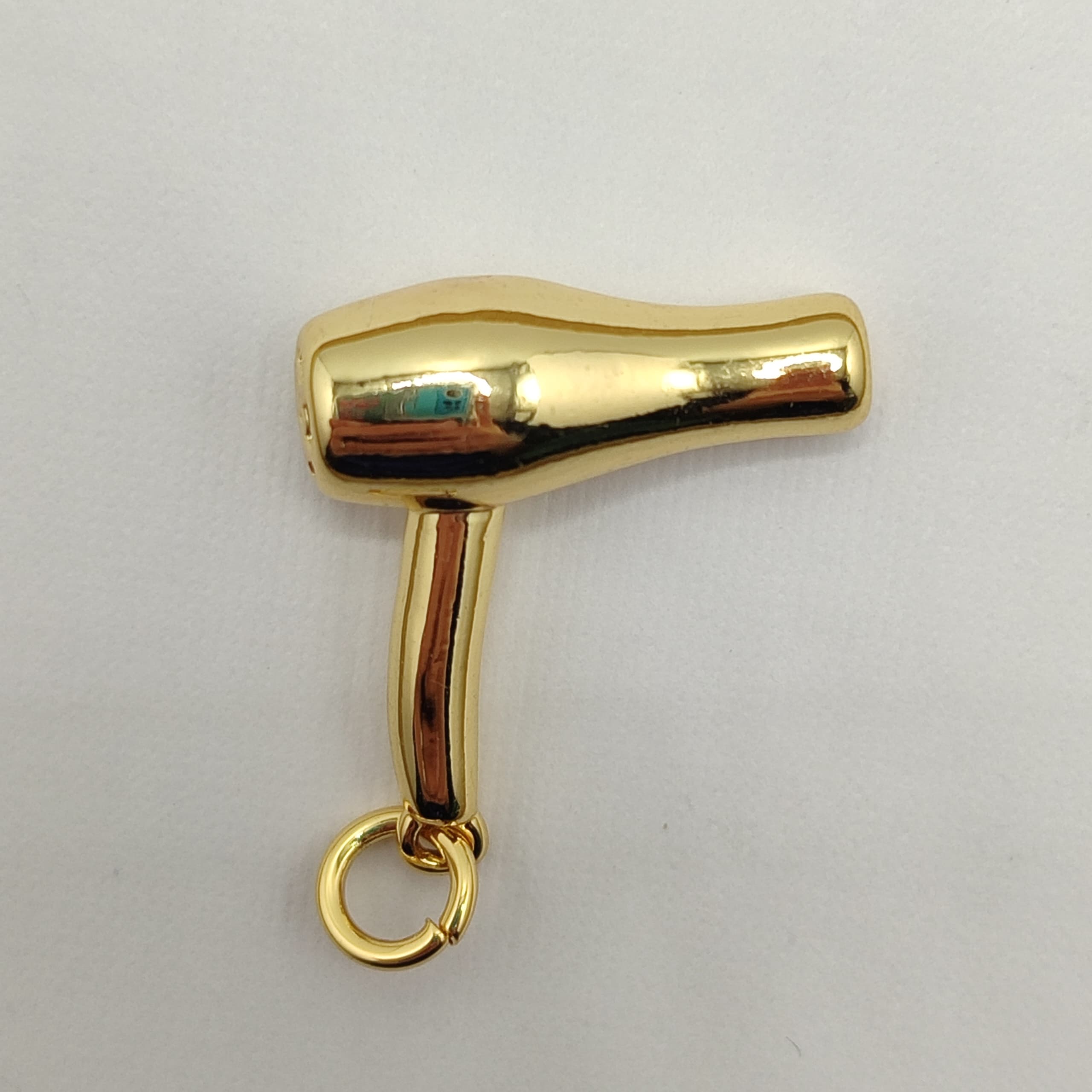 ORO CHINO DIJE SECADOR