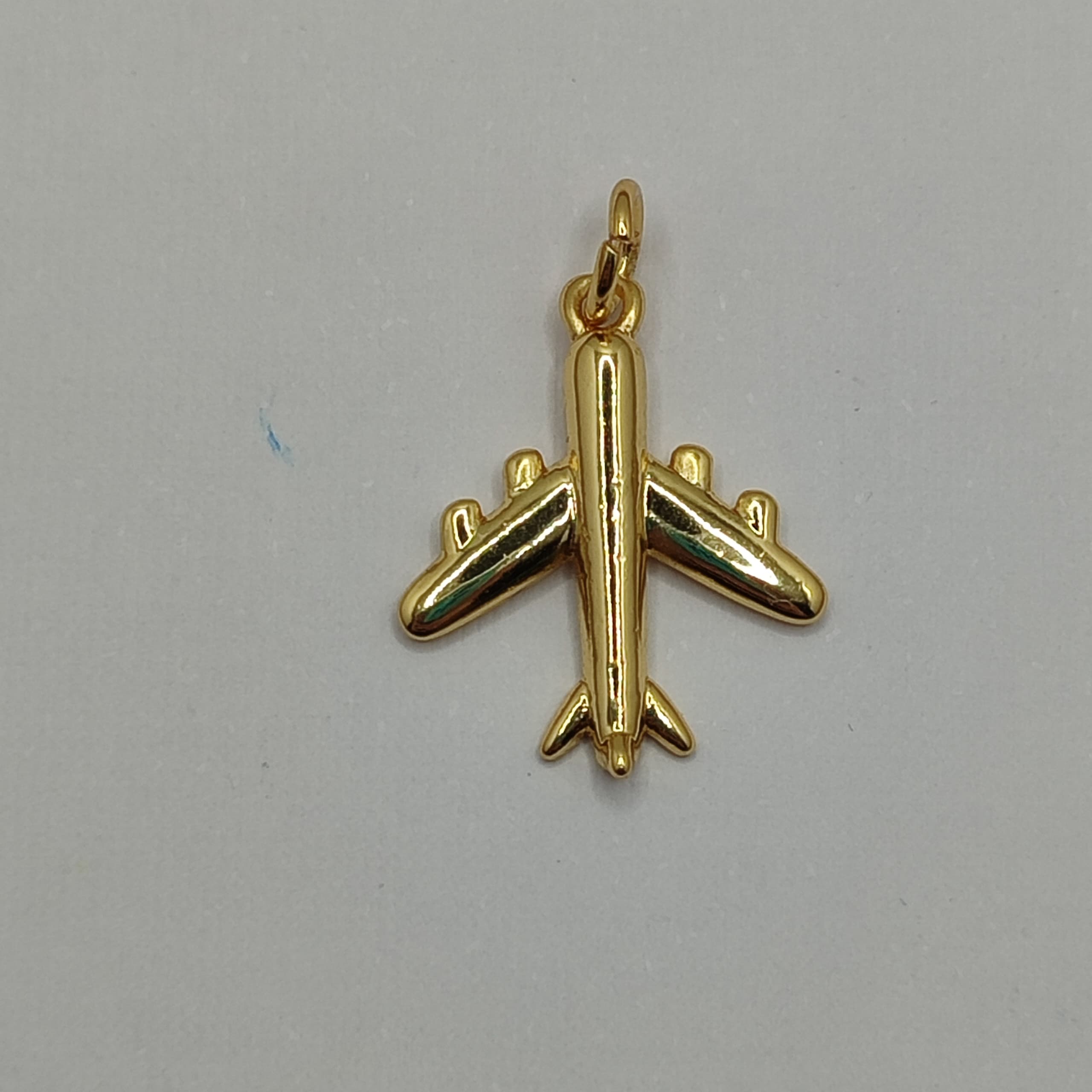 ORO CHINO DIJE AVION