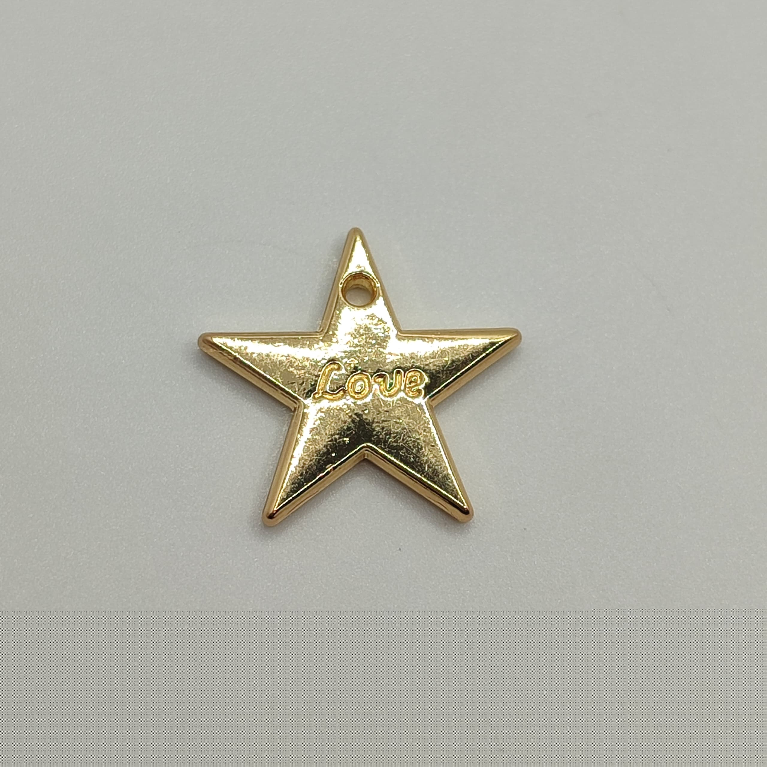 ORO CHINO DIJE ESTRELLA LOVE
