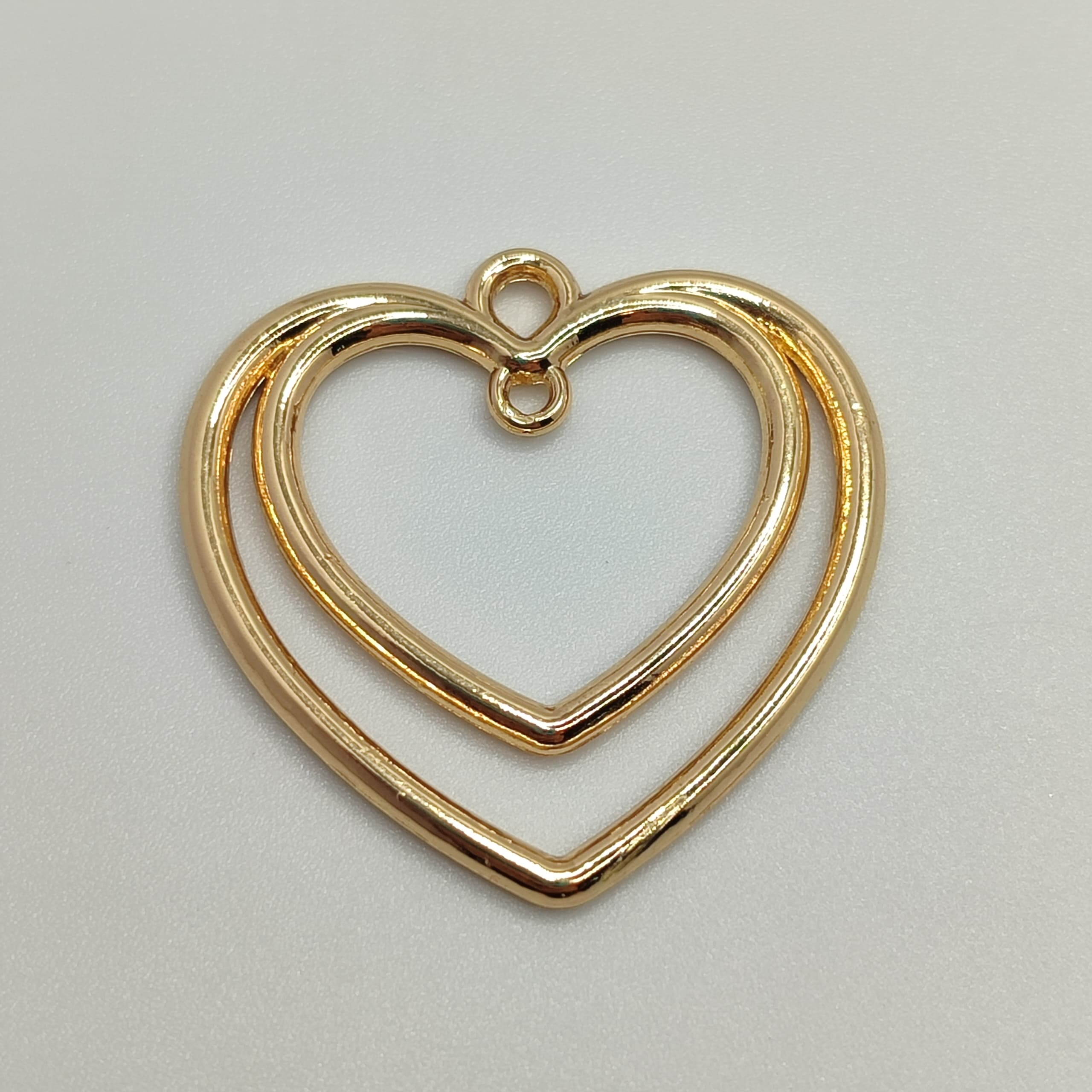 ORO CHINO DIJE CORAZON DOBLE HUECO
