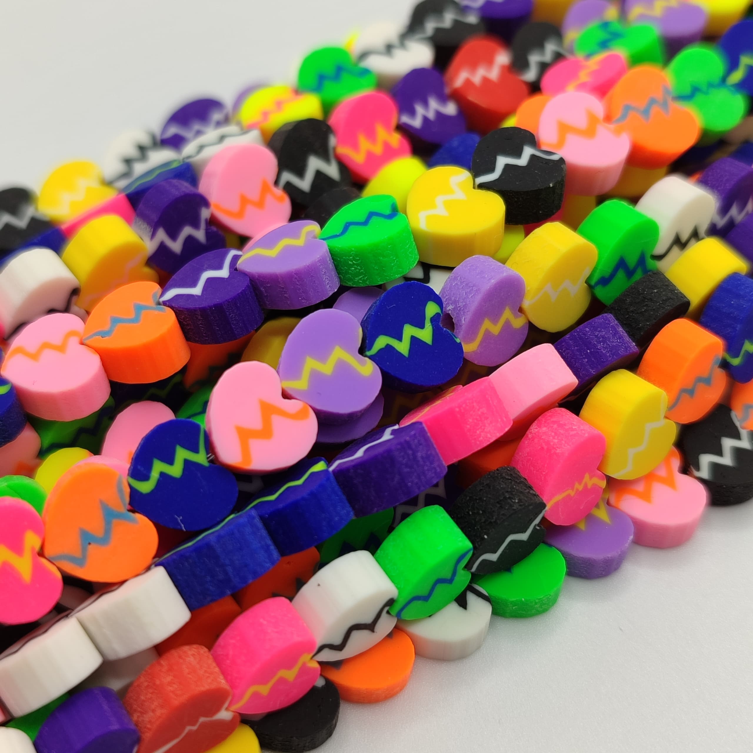 FIMO CORAZON  COLORES ROTO