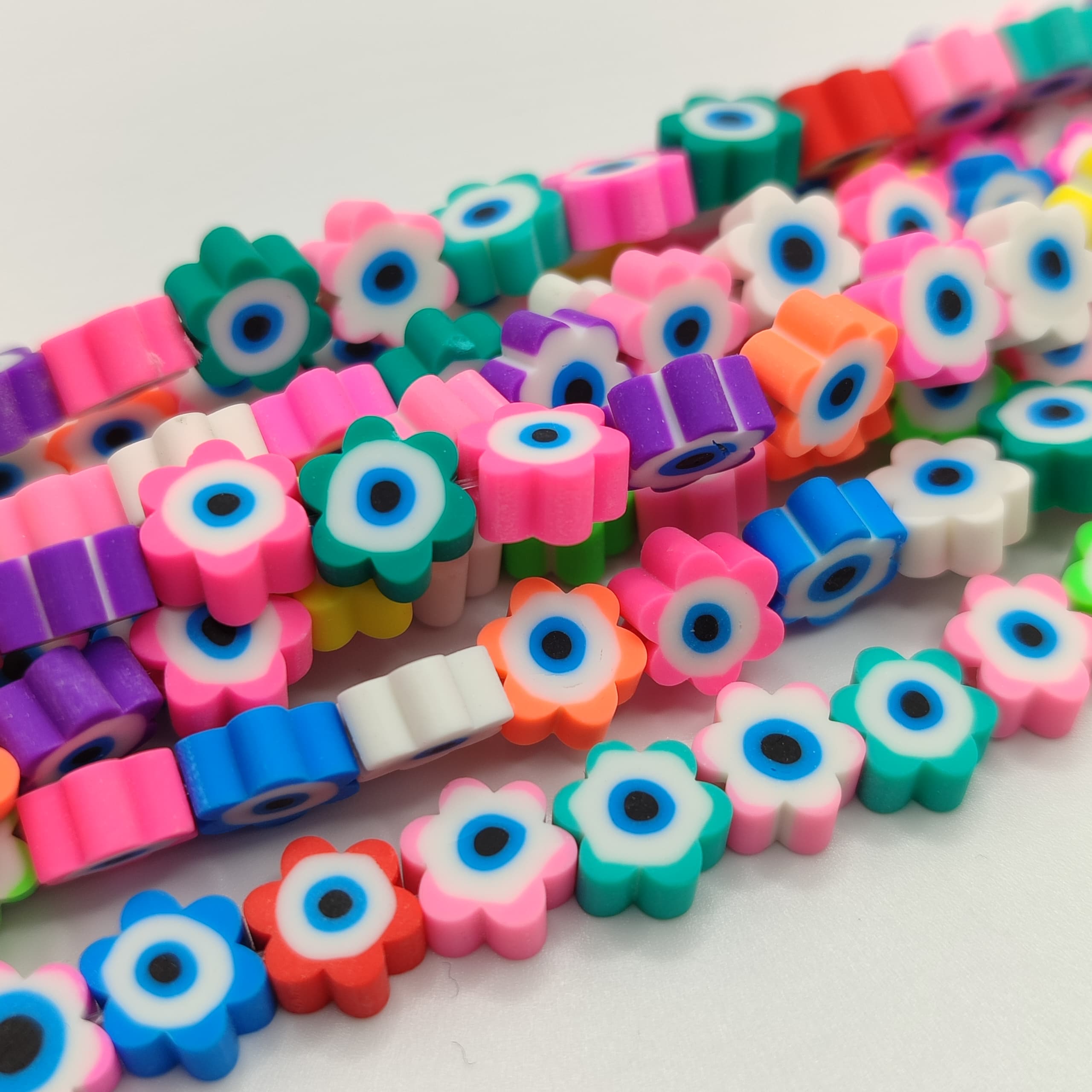 FIMO FLORES CON OJO TURCO