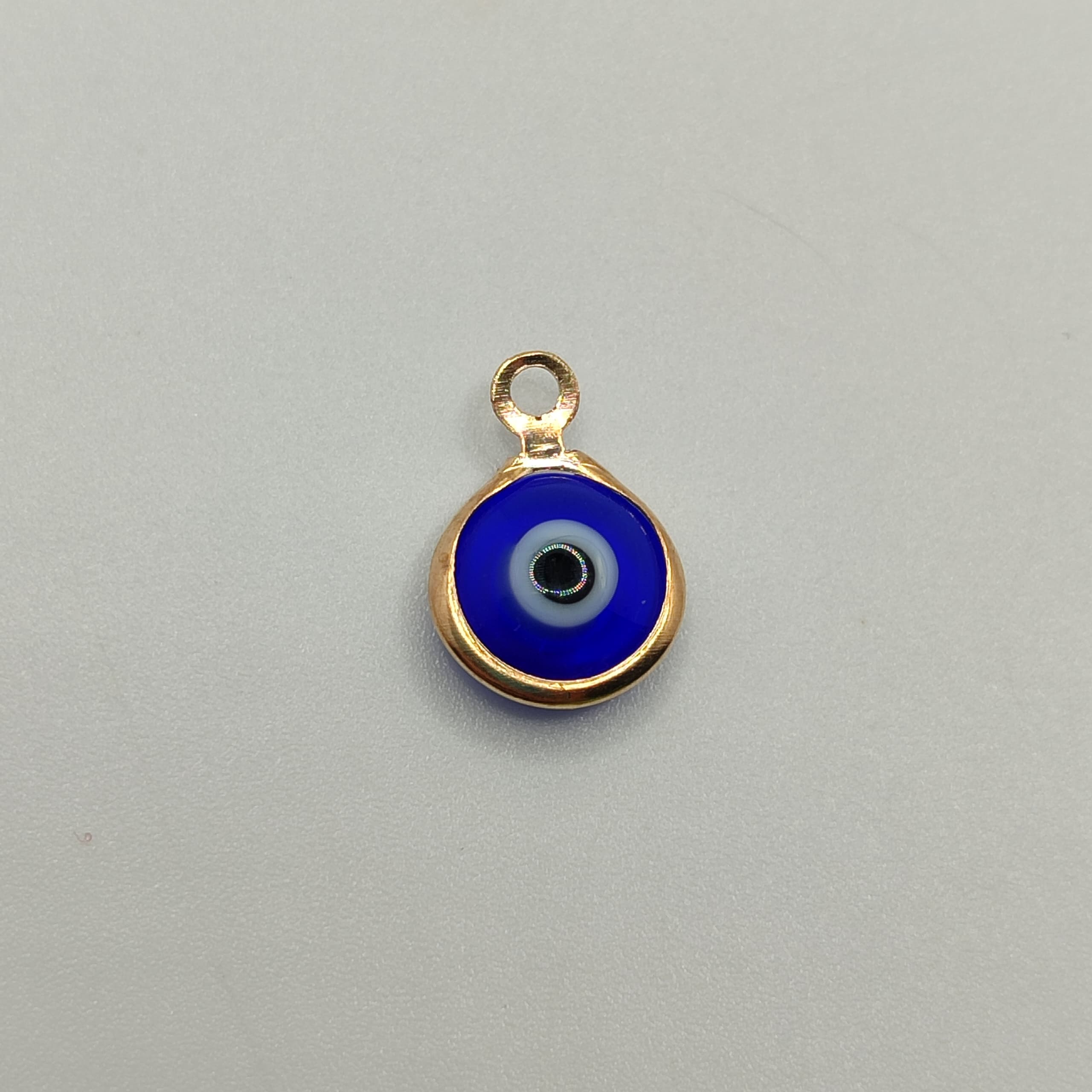 OJOS TURCOS FANTASIA DIJE AZUL REY DORADO