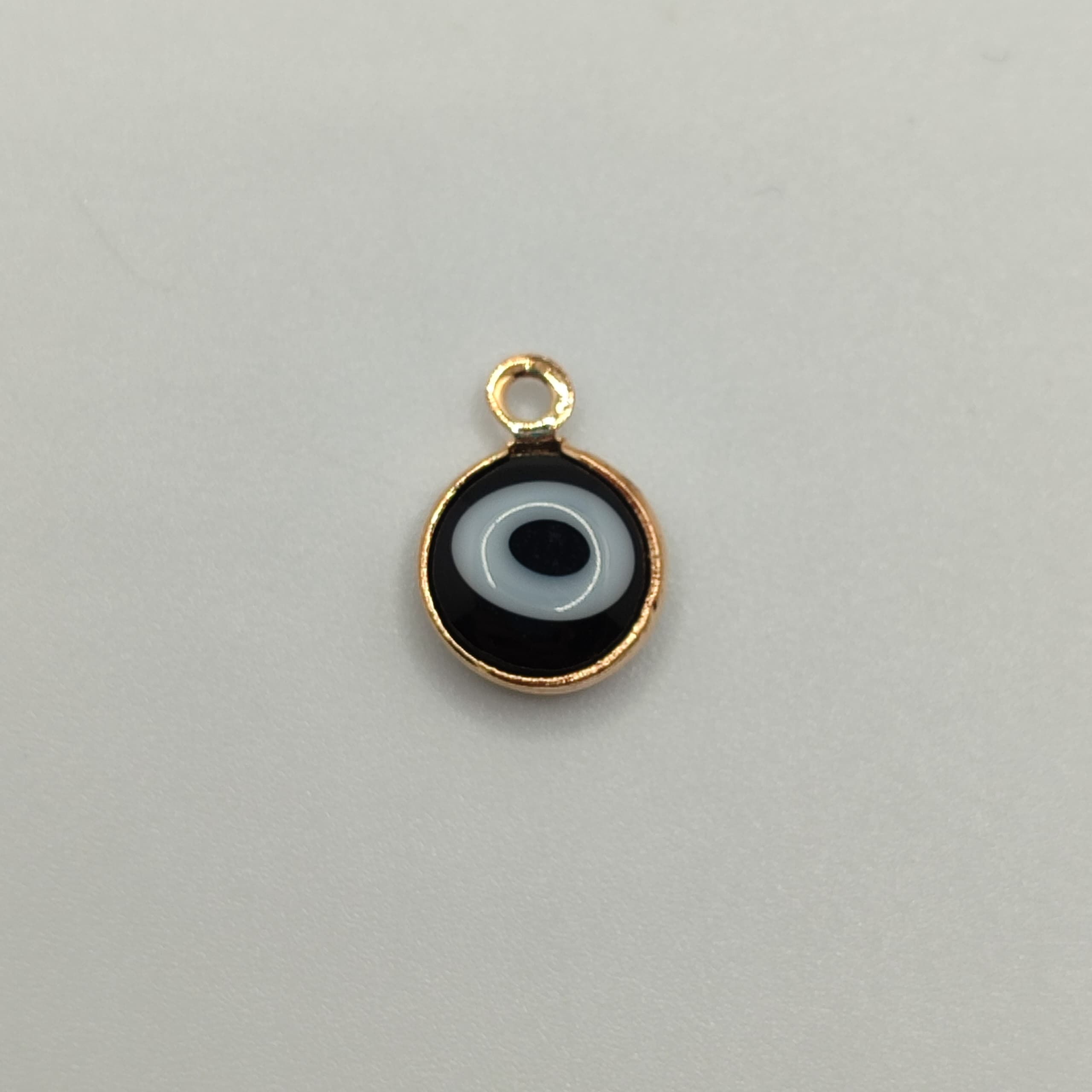 OJOS TURCOS FANTASIA DIJE NEGRO DORADO 8