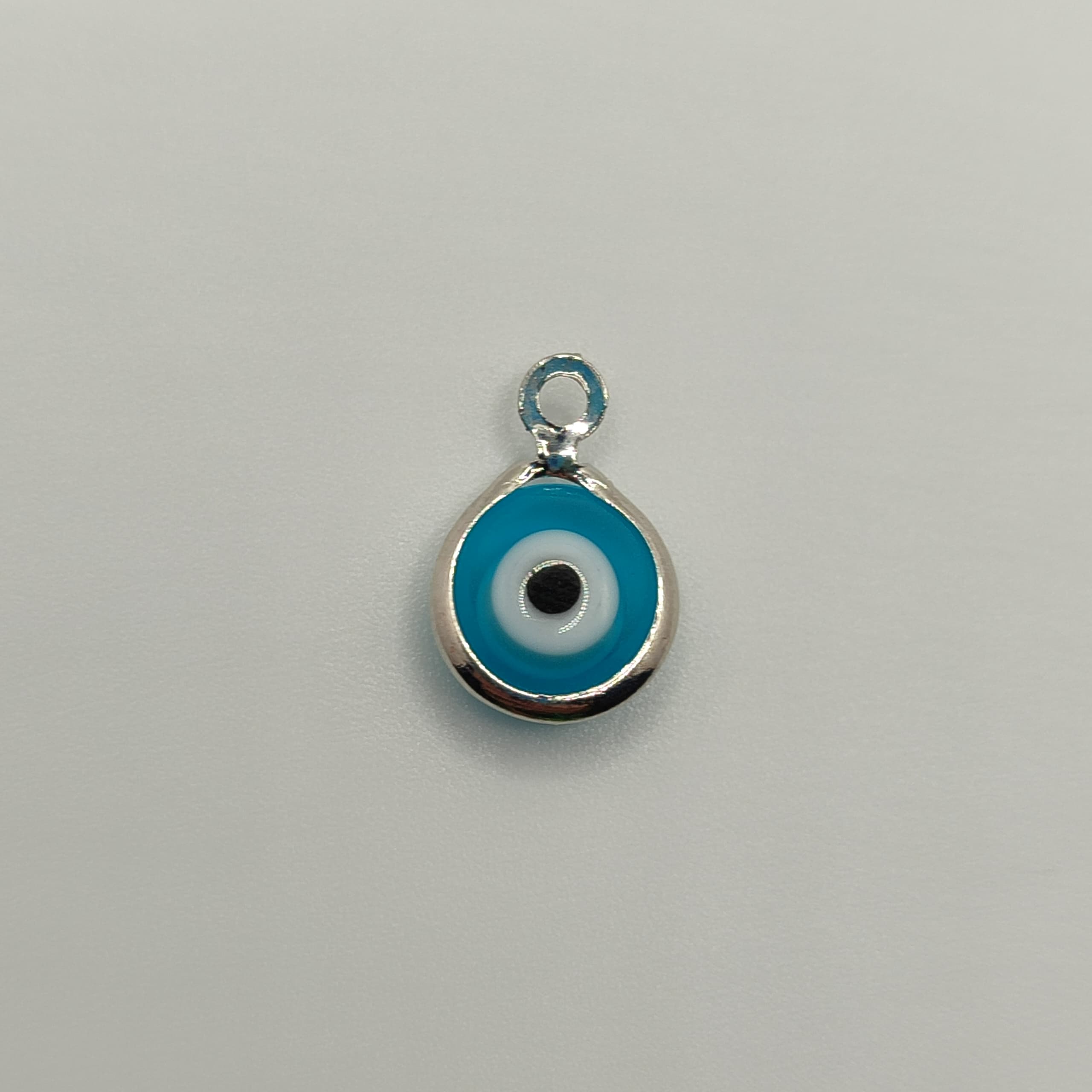 OJOS TURCOS FANTASIA DIJE AZUL CLARO PLAT