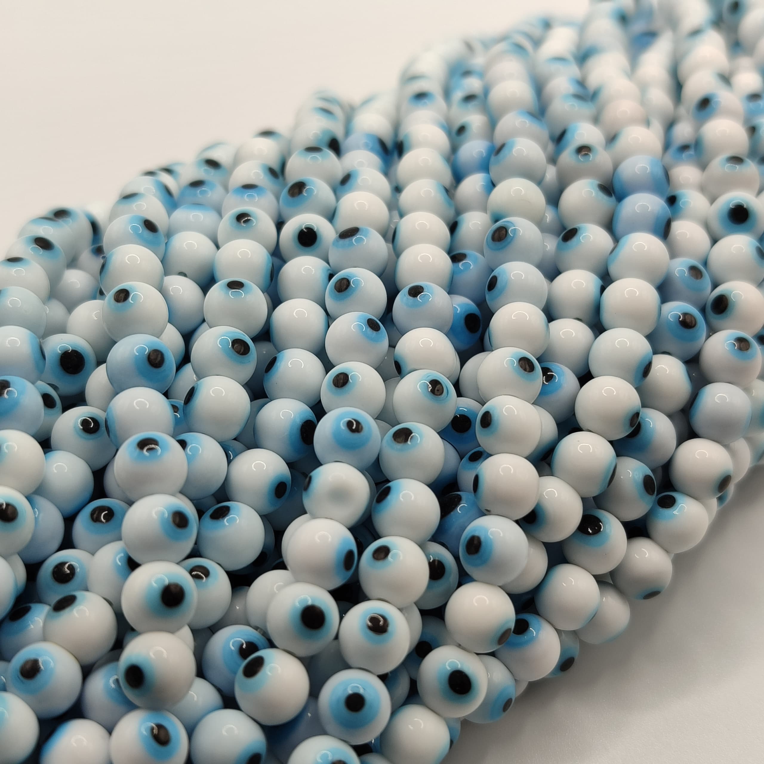 OJOS TURCOS REDONDOS BLANCO 6M M