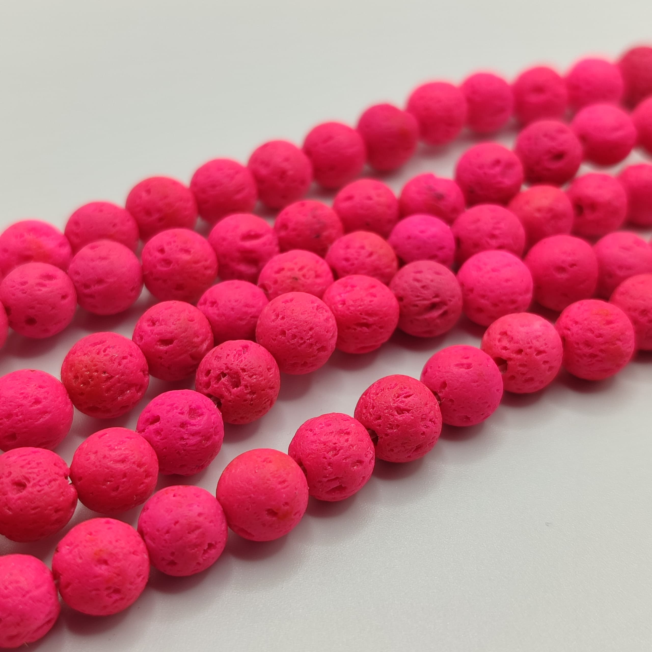 PIEDRA VOLCANICA FUCSIA NEON 8MM