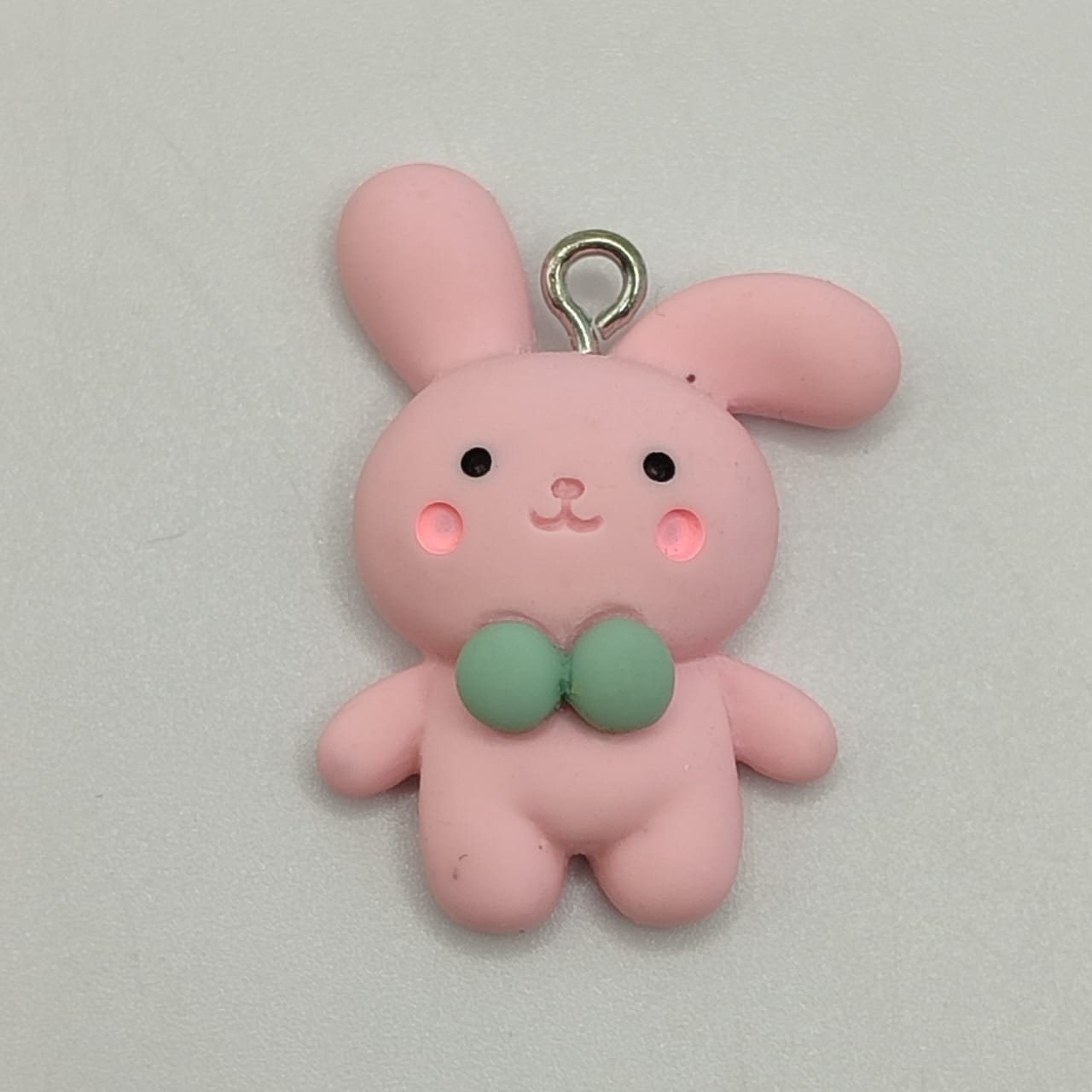 RESINA DE CONEJO ROSADO CON LAZO TURQUE