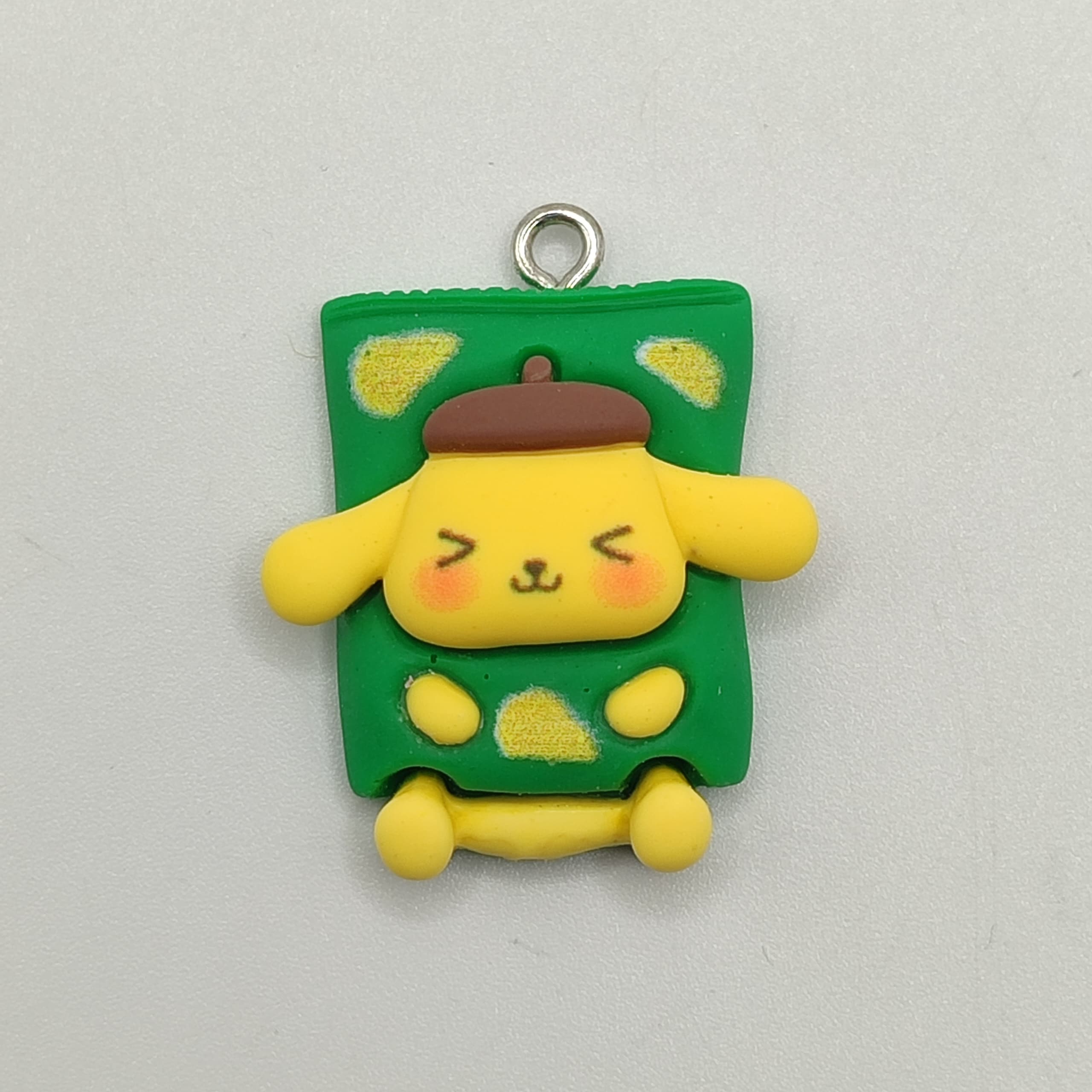 DIJE RESINA POMPOMPURIN CUADRADO