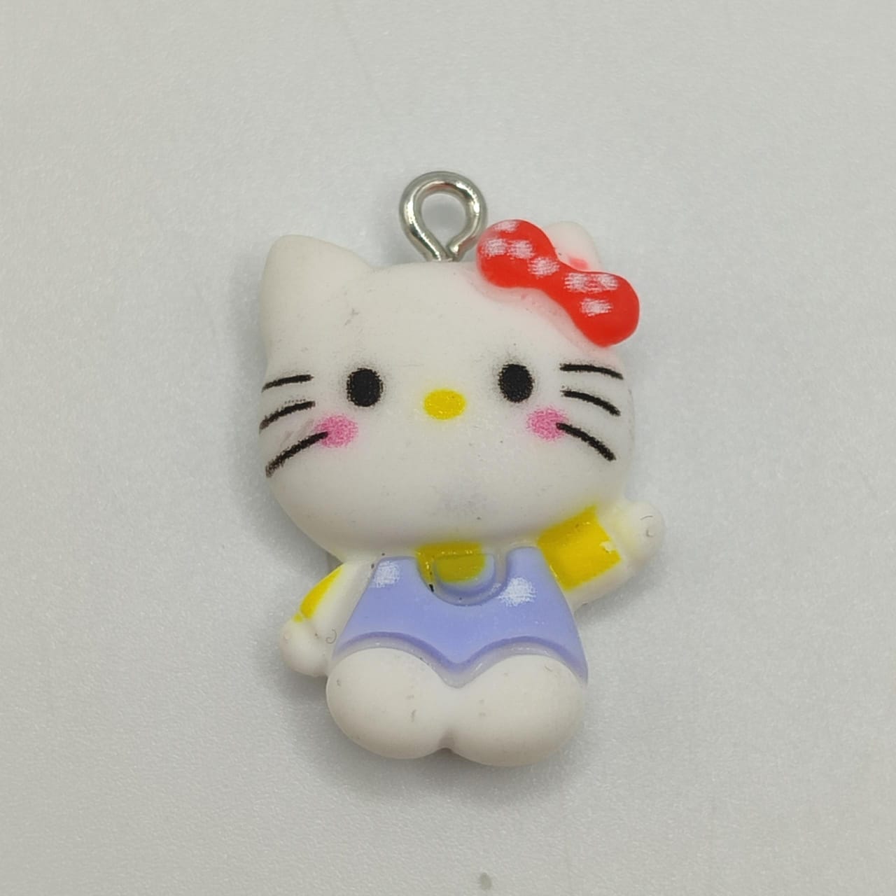 DIJE RESINA HELLO KITTY BRAGA AZUL