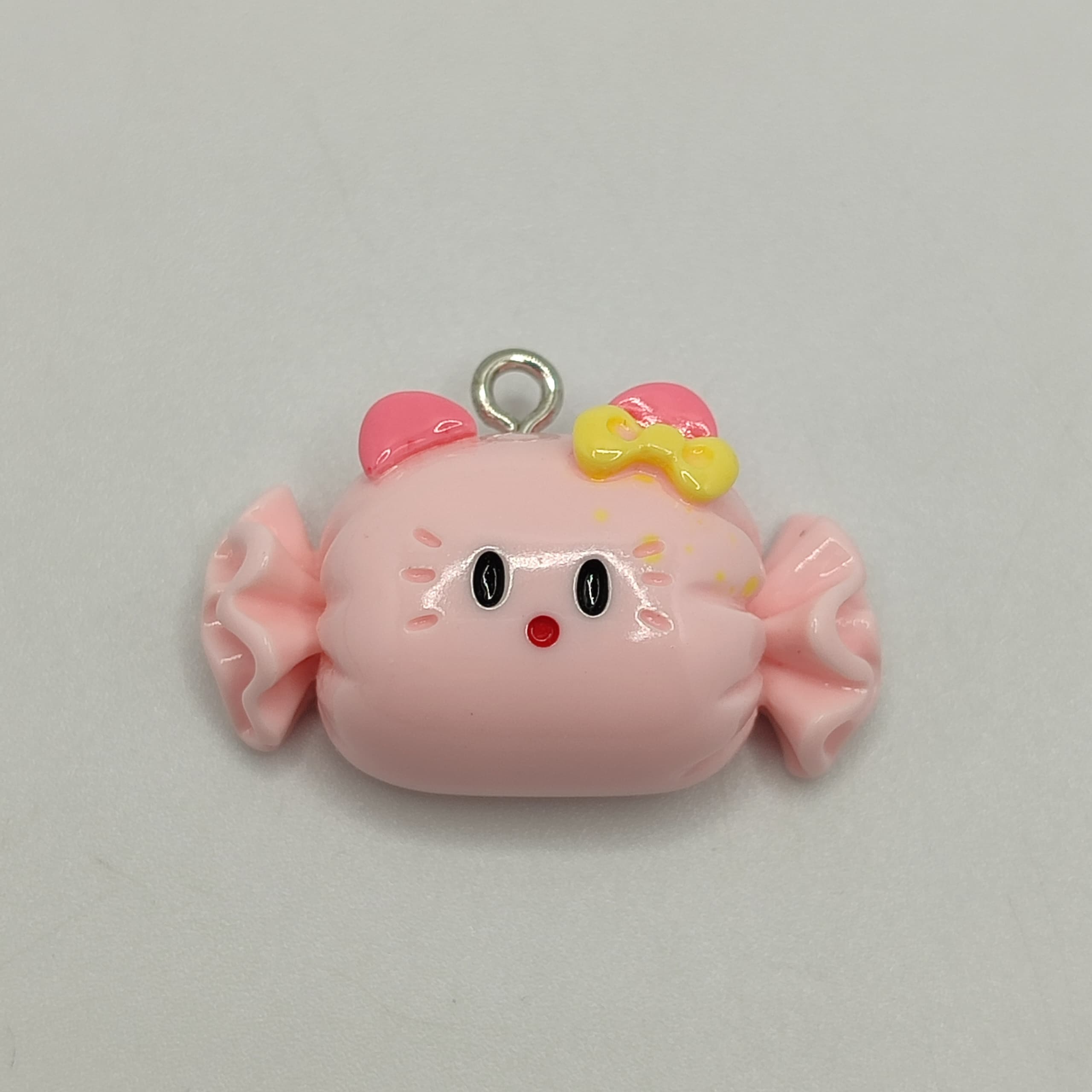 RESINA DIJE CARAMELO ROSADO HELLO KITTY