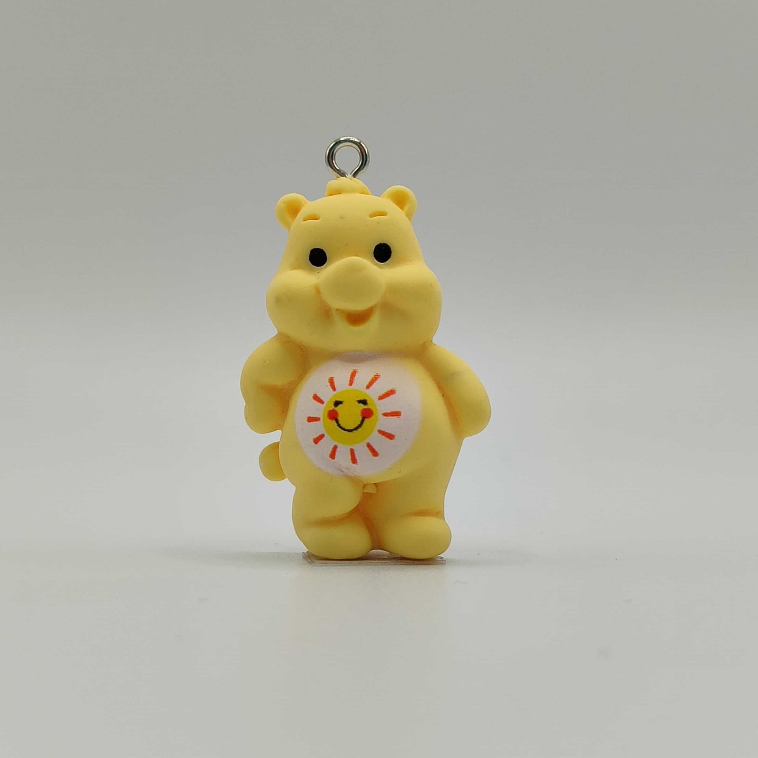 RESINA OSO CARIÑOSITO AMARILLO CON SOL
