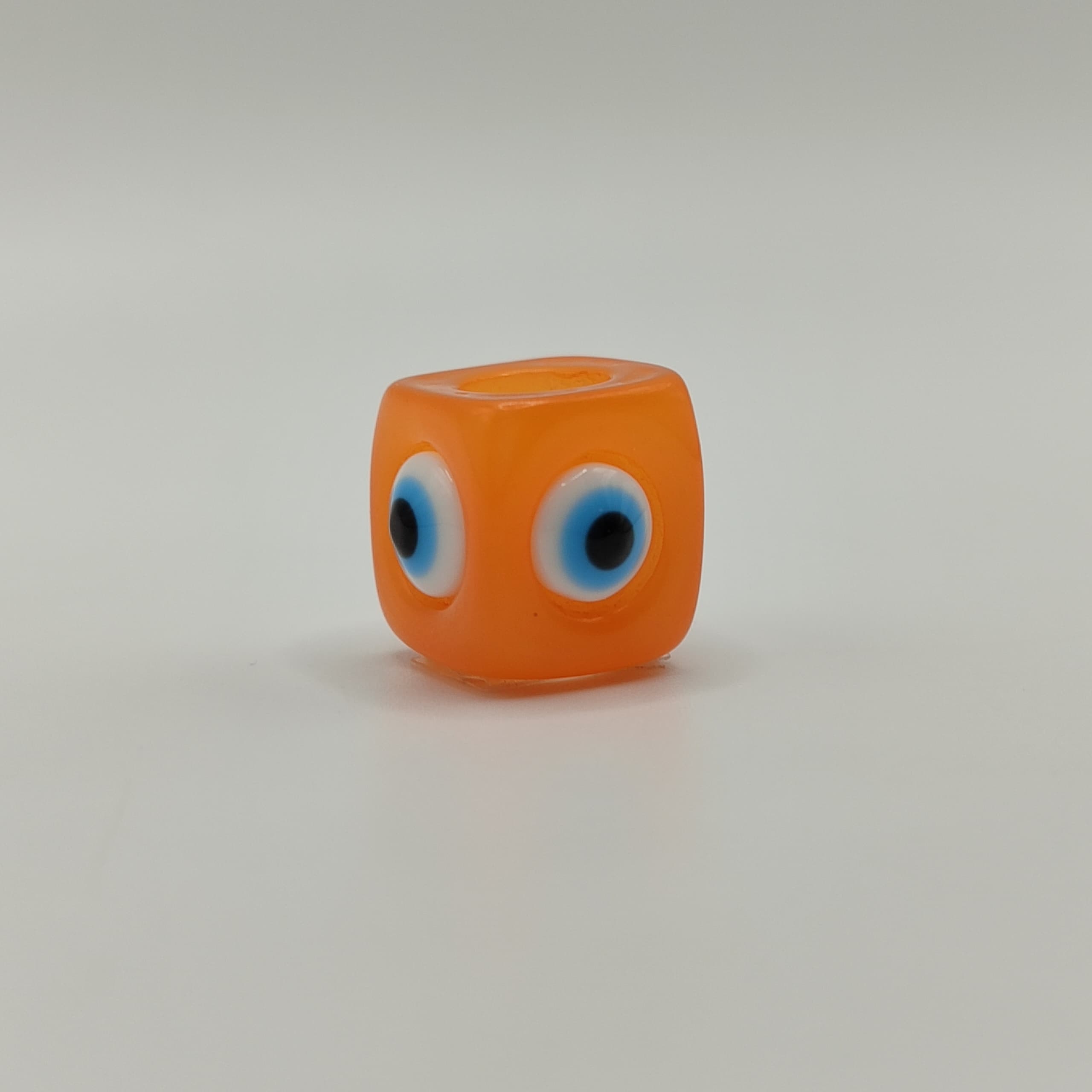 RESINA OJO CUBO NARANJA