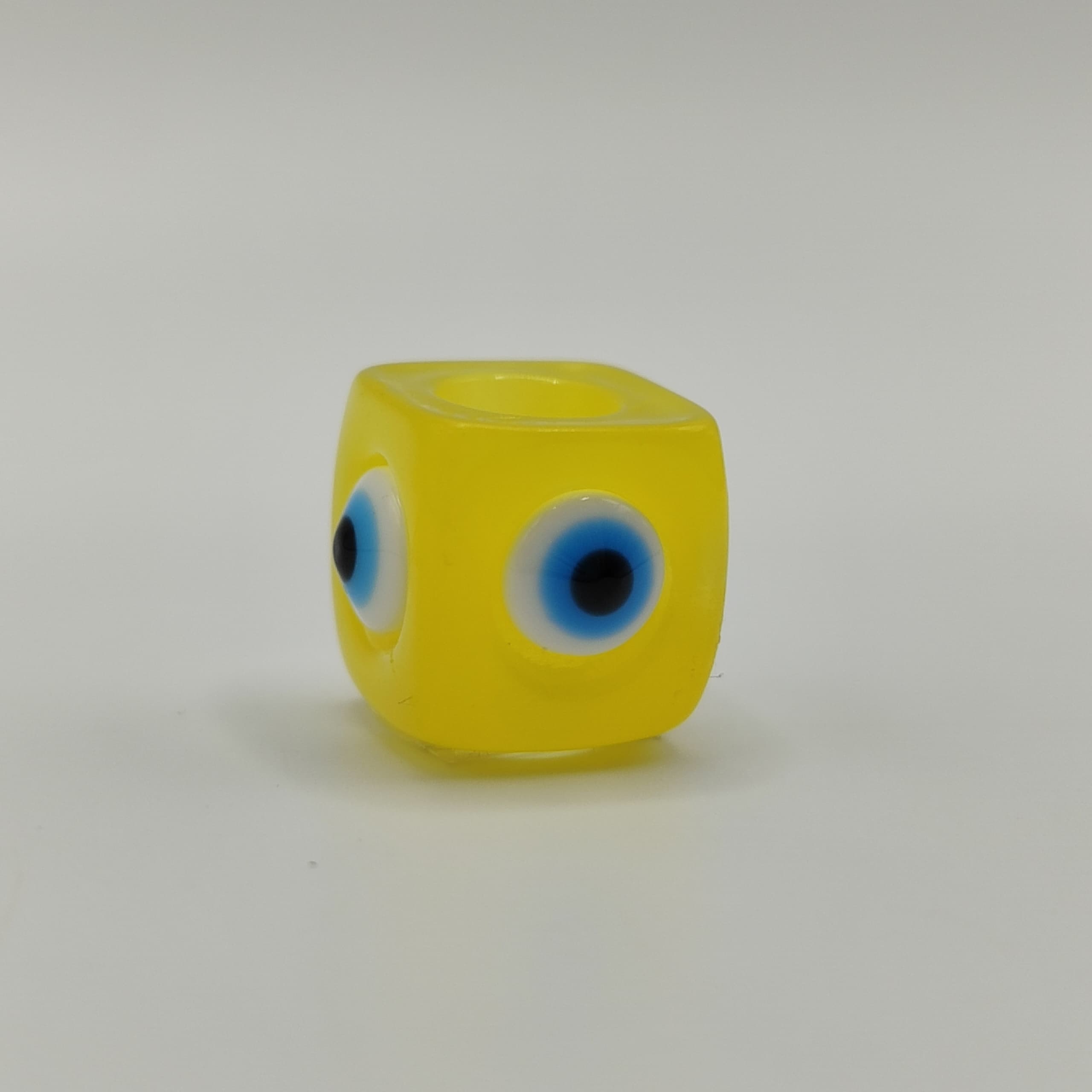 RESINA OJO CUBO AMARILLO