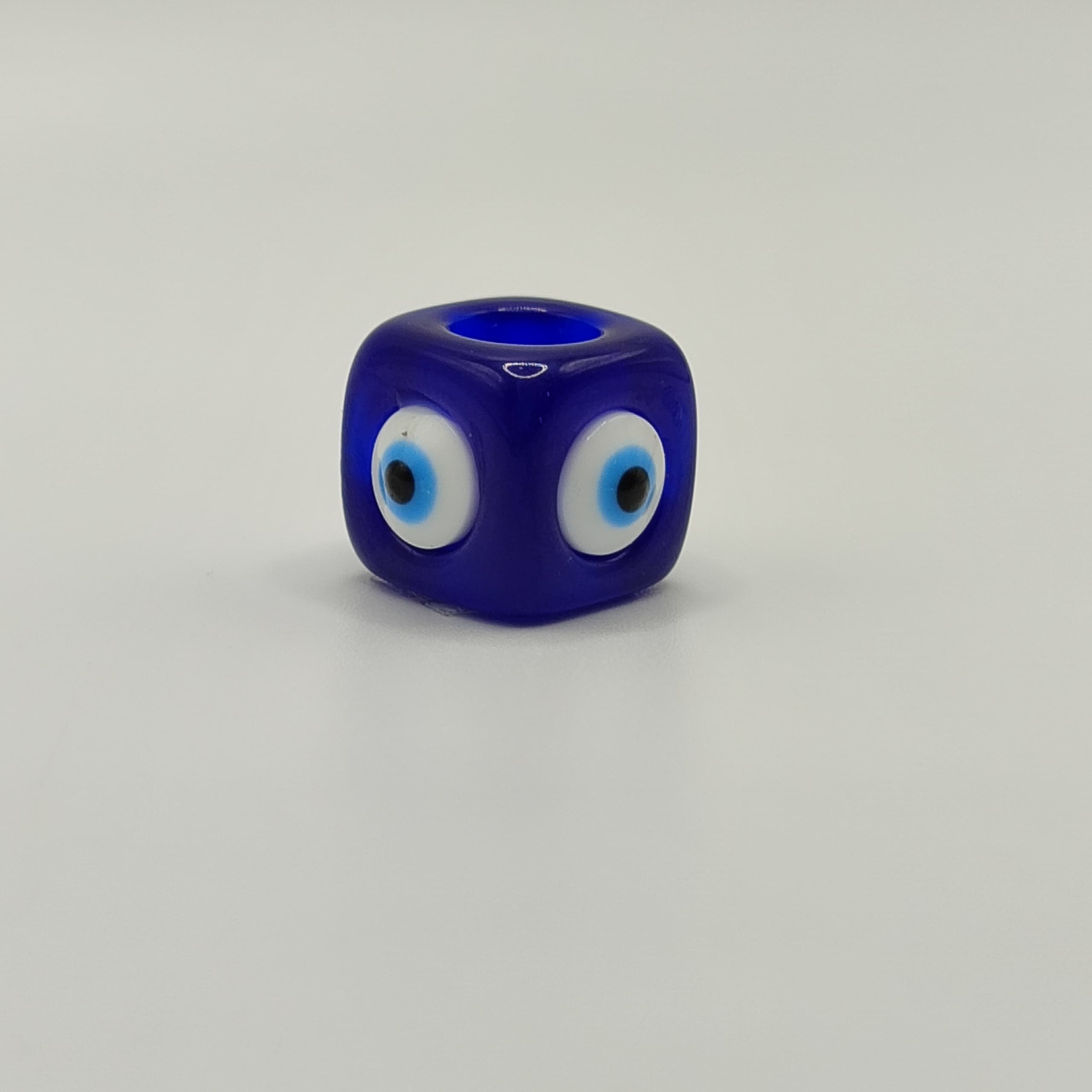 RESINA OJO CUBO AZUL REY