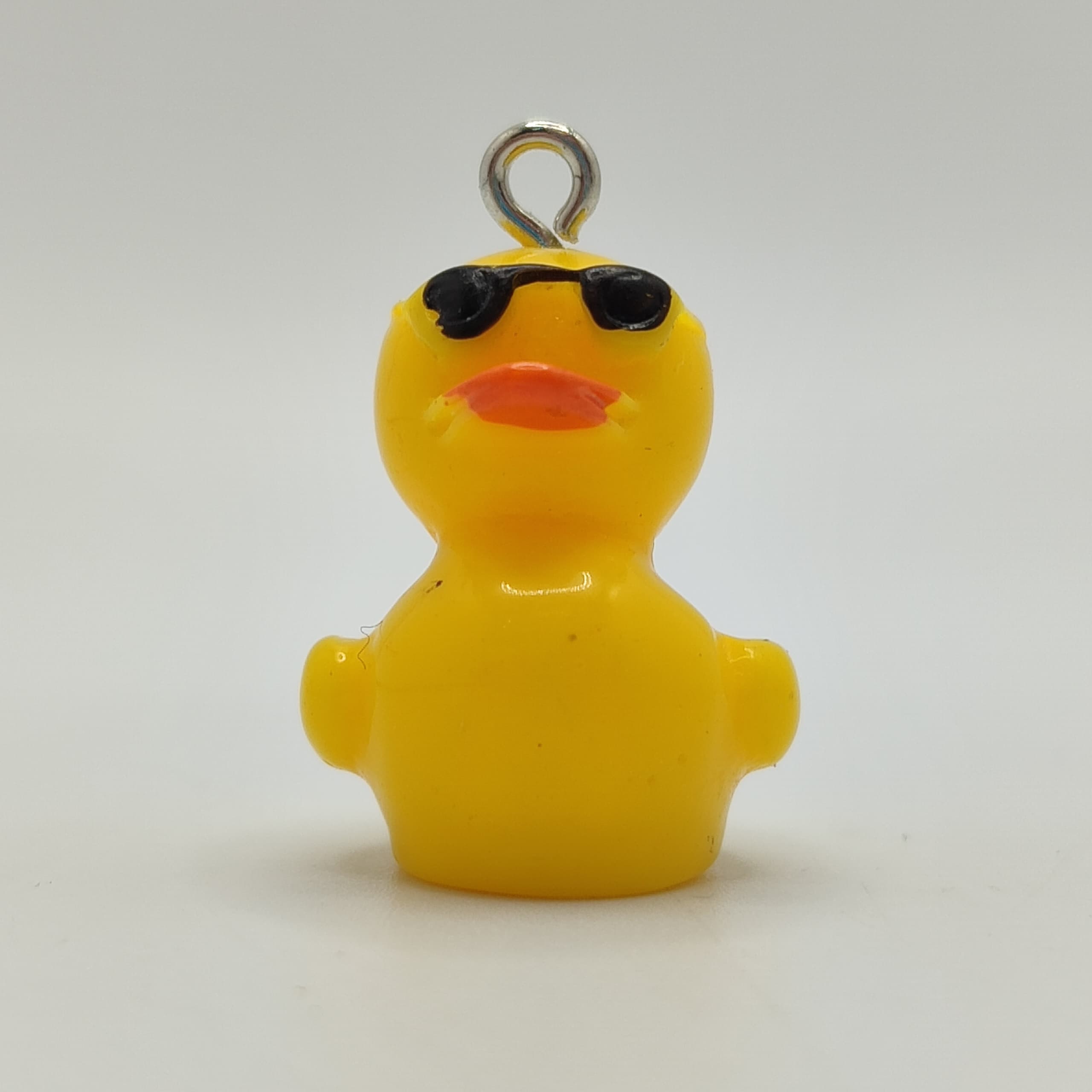 RESINA DIJE PATITO AMARILLO CON LENTES