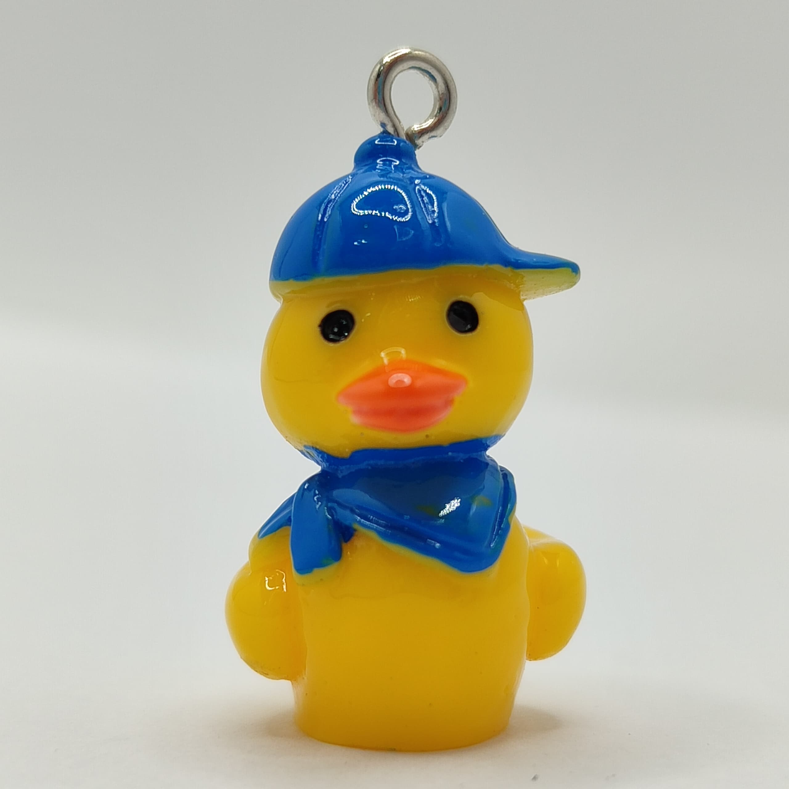 RESINA DIJE PATITO AMARILLO CON GORRA