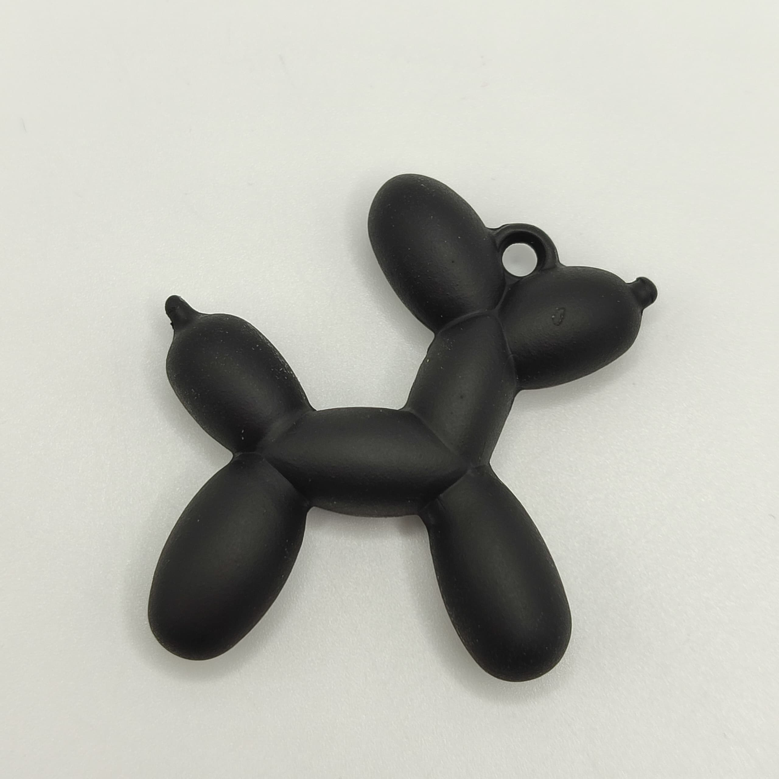 RESINA CACHORRO NEGRO