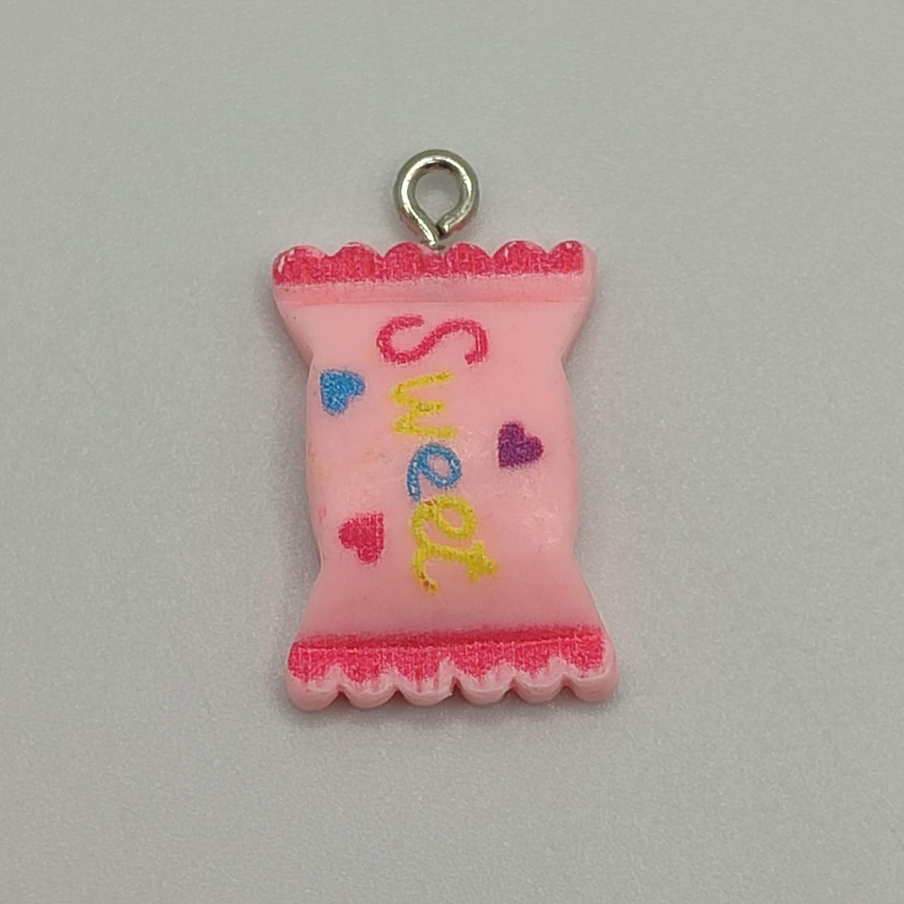 RESINA CARAMELO ROSADO DIJE